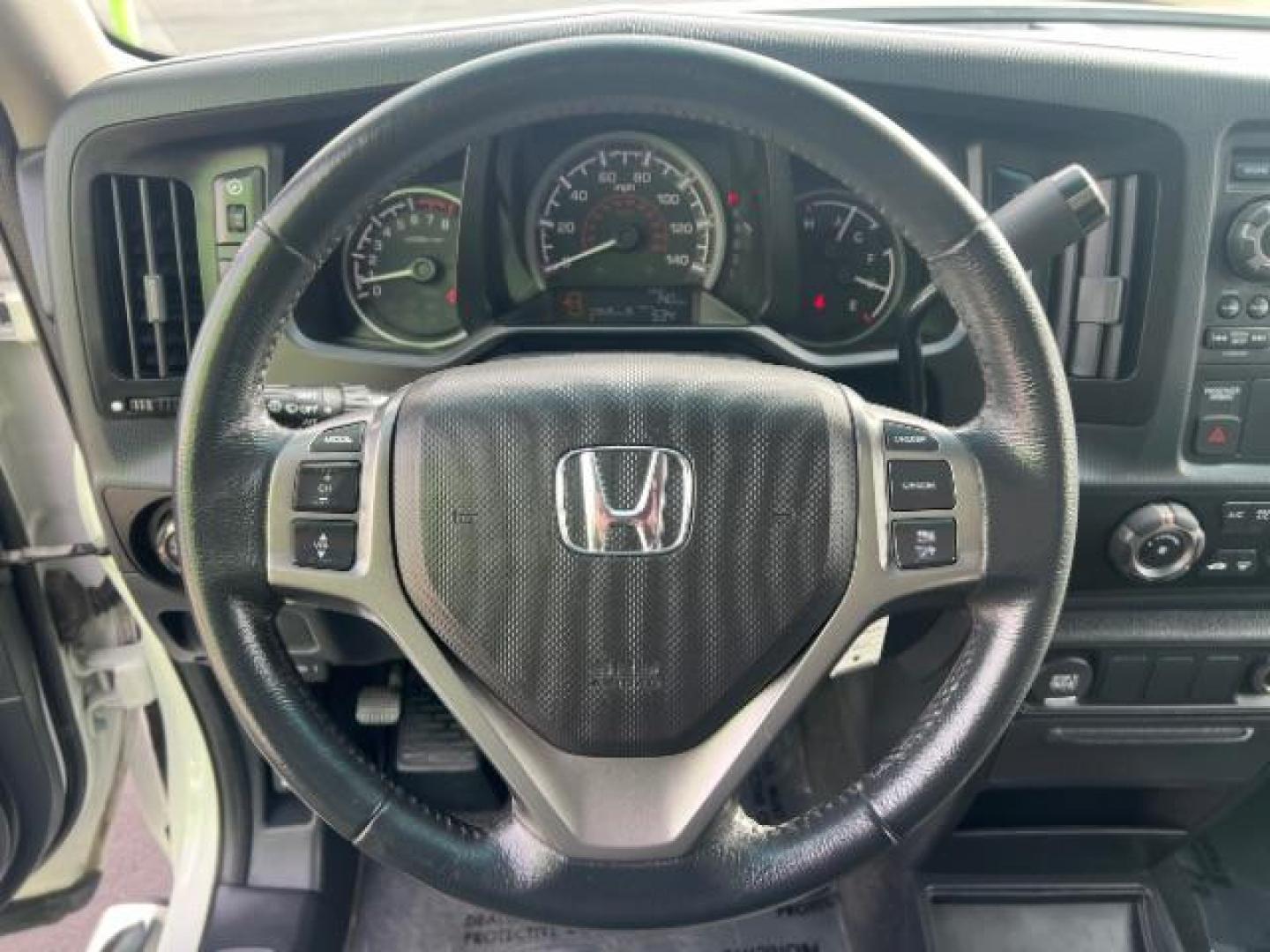 2014 White /Black Honda Ridgeline Sport (5FPYK1F75EB) with an 3.5L V6 SOHC 24V engine, 5-Speed Automatic transmission, located at 1865 East Red Hills Pkwy, St. George, 84770, (435) 628-0023, 37.120850, -113.543640 - We specialize in helping ALL people get the best financing available. No matter your credit score, good, bad or none we can get you an amazing rate. Had a bankruptcy, divorce, or repossessions? We give you the green light to get your credit back on the road. Low down and affordable payments that fit - Photo#16