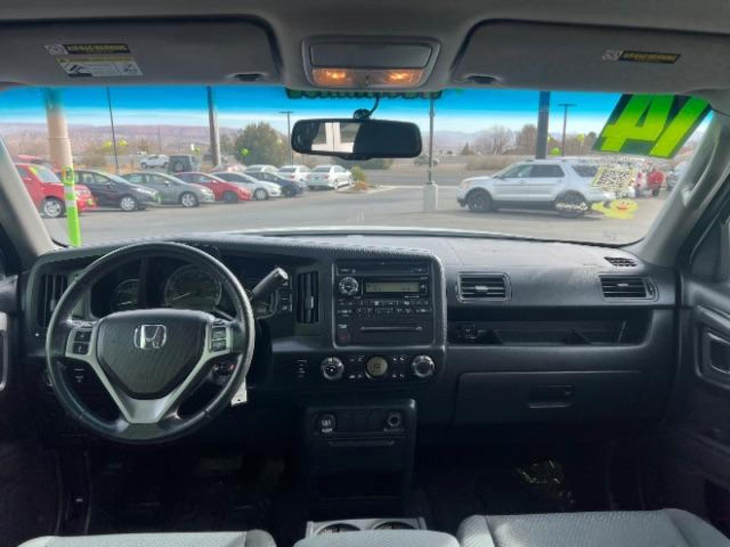 2014 White /Black Honda Ridgeline Sport (5FPYK1F75EB) with an 3.5L V6 SOHC 24V engine, 5-Speed Automatic transmission, located at 1865 East Red Hills Pkwy, St. George, 84770, (435) 628-0023, 37.120850, -113.543640 - We specialize in helping ALL people get the best financing available. No matter your credit score, good, bad or none we can get you an amazing rate. Had a bankruptcy, divorce, or repossessions? We give you the green light to get your credit back on the road. Low down and affordable payments that fit - Photo#23