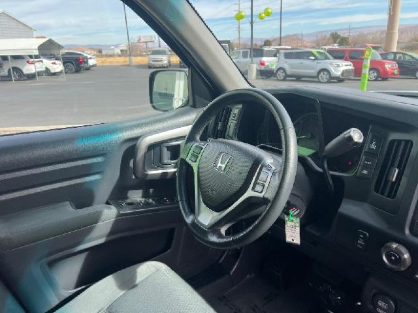 2014 White /Black Honda Ridgeline Sport (5FPYK1F75EB) with an 3.5L V6 SOHC 24V engine, 5-Speed Automatic transmission, located at 1865 East Red Hills Pkwy, St. George, 84770, (435) 628-0023, 37.120850, -113.543640 - We specialize in helping ALL people get the best financing available. No matter your credit score, good, bad or none we can get you an amazing rate. Had a bankruptcy, divorce, or repossessions? We give you the green light to get your credit back on the road. Low down and affordable payments that fit - Photo#30