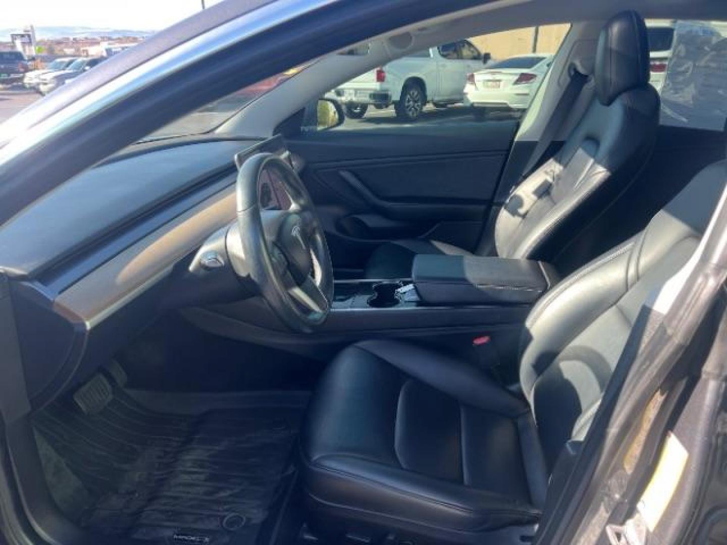 2018 Gray /Black Tesla Model 3 Long Range (5YJ3E1EB8JF) with an Electric engine, 1 Speed-Automatic transmission, located at 1865 East Red Hills Pkwy, St. George, 84770, (435) 628-0023, 37.120850, -113.543640 - COMING SOON! ****Price includes $4k IRS EV REBATE**** We are setup with IRS to file the rebate directly and take credit off the price of car. Check with IRS EV website to be sure you qualify. Trump has threatened to end rebate so ACT FAST! Long Range AWD in excellent condition. Upgraded computer r - Photo#16