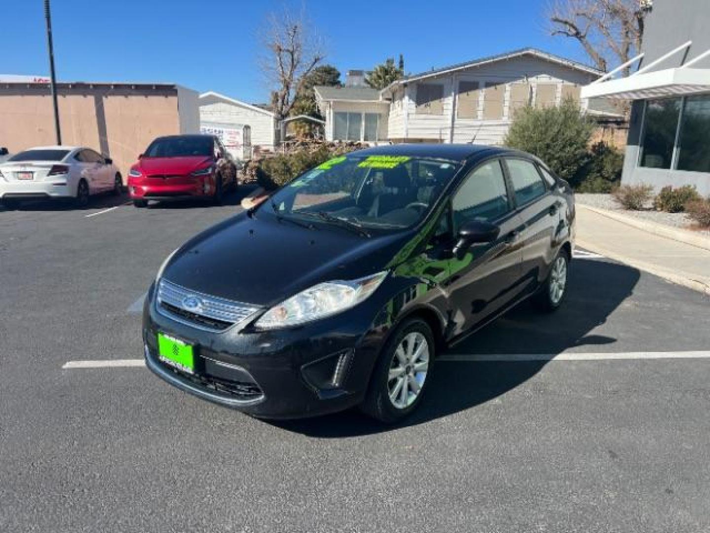 2012 Tuxedo Black Metallic /Charcoal Black/Light Stone Ford Fiesta SE (3FADP4BJ3CM) with an 1.6L I-4 DOHC engine, 5-Speed Manual transmission, located at 1865 East Red Hills Pkwy, St. George, 84770, (435) 628-0023, 37.120850, -113.543640 - Photo#2