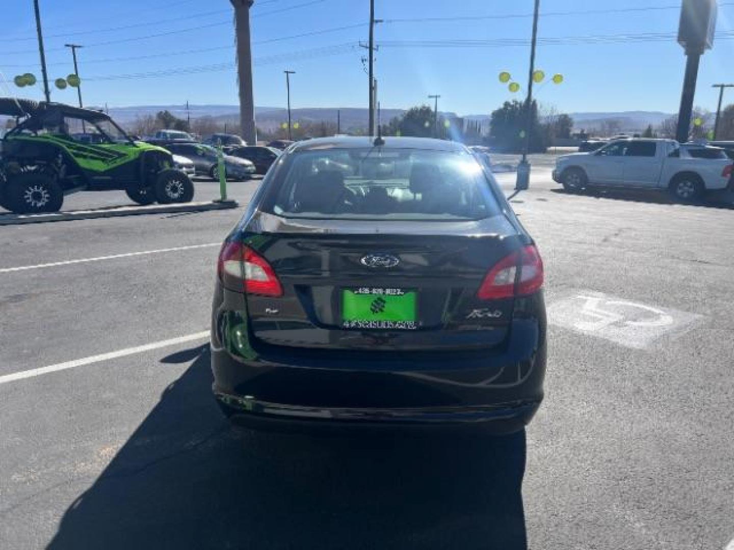 2012 Tuxedo Black Metallic /Charcoal Black/Light Stone Ford Fiesta SE (3FADP4BJ3CM) with an 1.6L I-4 DOHC engine, 5-Speed Manual transmission, located at 1865 East Red Hills Pkwy, St. George, 84770, (435) 628-0023, 37.120850, -113.543640 - Photo#5