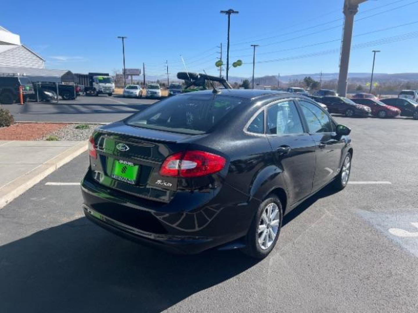 2012 Tuxedo Black Metallic /Charcoal Black/Light Stone Ford Fiesta SE (3FADP4BJ3CM) with an 1.6L I-4 DOHC engine, 5-Speed Manual transmission, located at 1865 East Red Hills Pkwy, St. George, 84770, (435) 628-0023, 37.120850, -113.543640 - Photo#6