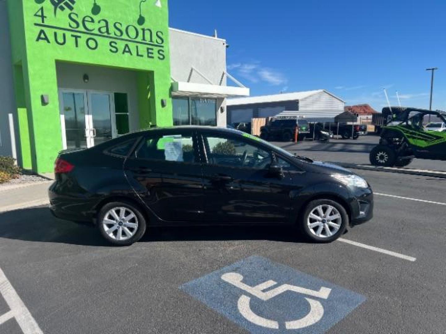 2012 Tuxedo Black Metallic /Charcoal Black/Light Stone Ford Fiesta SE (3FADP4BJ3CM) with an 1.6L I-4 DOHC engine, 5-Speed Manual transmission, located at 1865 East Red Hills Pkwy, St. George, 84770, (435) 628-0023, 37.120850, -113.543640 - Photo#7