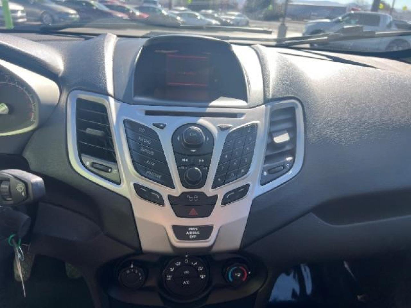2012 Tuxedo Black Metallic /Charcoal Black/Light Stone Ford Fiesta SE (3FADP4BJ3CM) with an 1.6L I-4 DOHC engine, 5-Speed Manual transmission, located at 1865 East Red Hills Pkwy, St. George, 84770, (435) 628-0023, 37.120850, -113.543640 - Photo#16