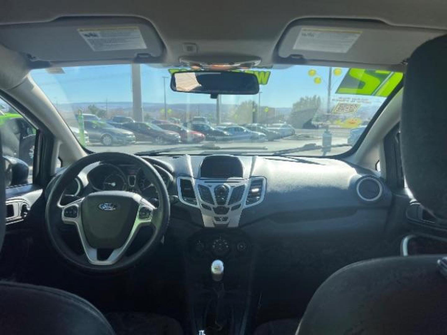2012 Tuxedo Black Metallic /Charcoal Black/Light Stone Ford Fiesta SE (3FADP4BJ3CM) with an 1.6L I-4 DOHC engine, 5-Speed Manual transmission, located at 1865 East Red Hills Pkwy, St. George, 84770, (435) 628-0023, 37.120850, -113.543640 - Photo#20