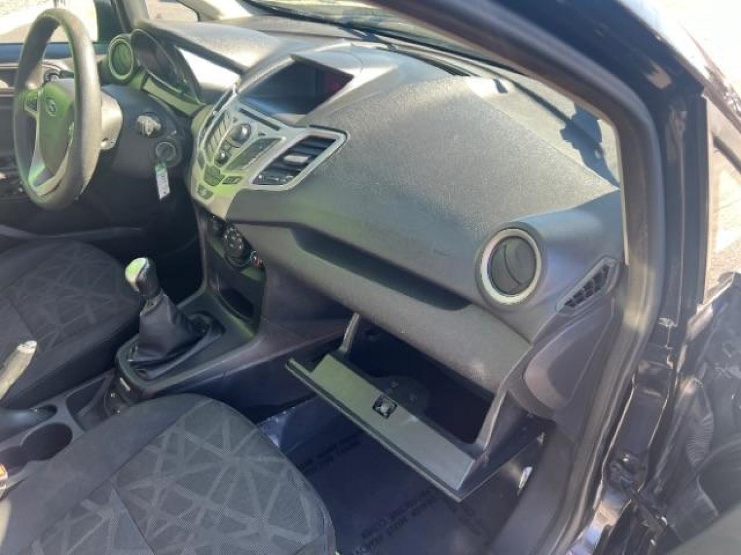 2012 Tuxedo Black Metallic /Charcoal Black/Light Stone Ford Fiesta SE (3FADP4BJ3CM) with an 1.6L I-4 DOHC engine, 5-Speed Manual transmission, located at 1865 East Red Hills Pkwy, St. George, 84770, (435) 628-0023, 37.120850, -113.543640 - Photo#27