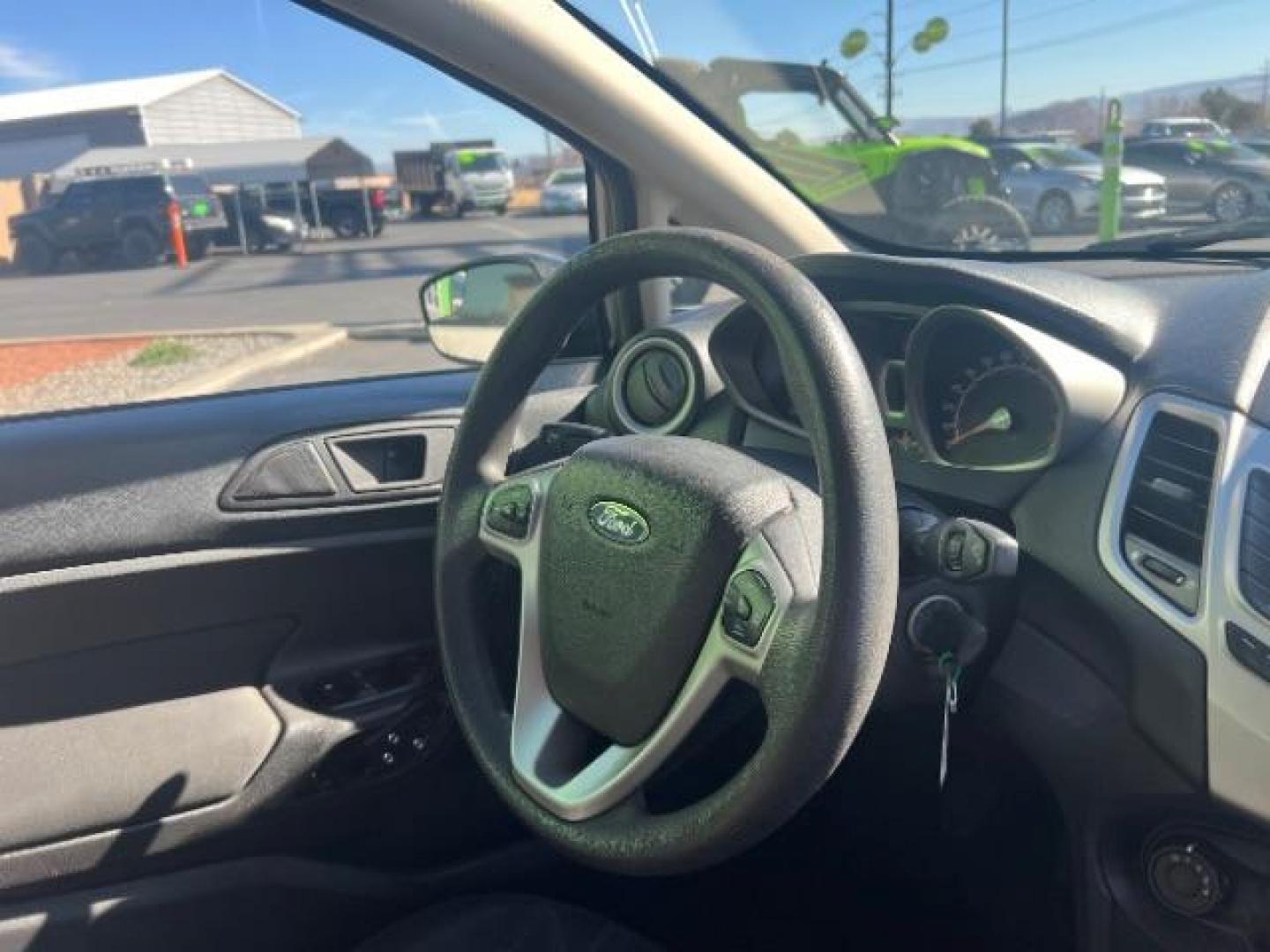 2012 Tuxedo Black Metallic /Charcoal Black/Light Stone Ford Fiesta SE (3FADP4BJ3CM) with an 1.6L I-4 DOHC engine, 5-Speed Manual transmission, located at 1865 East Red Hills Pkwy, St. George, 84770, (435) 628-0023, 37.120850, -113.543640 - Photo#28
