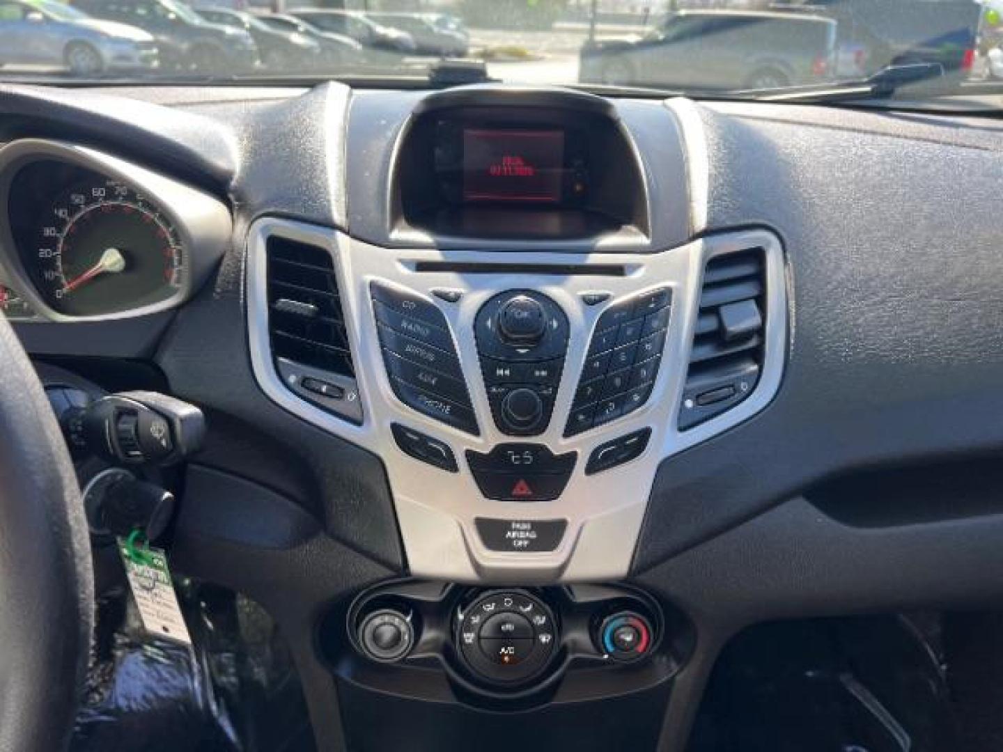 2012 Tuxedo Black Metallic /Charcoal Black/Light Stone Ford Fiesta SE (3FADP4BJ3CM) with an 1.6L I-4 DOHC engine, 5-Speed Manual transmission, located at 1865 East Red Hills Pkwy, St. George, 84770, (435) 628-0023, 37.120850, -113.543640 - Looking for a zippy, fuel-efficient car that is fun to drive and easy on your budget? This 2012 Ford Fiesta SE is just the ticket! Compact, stylish, and surprisingly well-equipped, this Fiesta comes loaded with air conditioning, heated front seats, chrome wheels, full size spare tire, deep tinted gl- Photo#17
