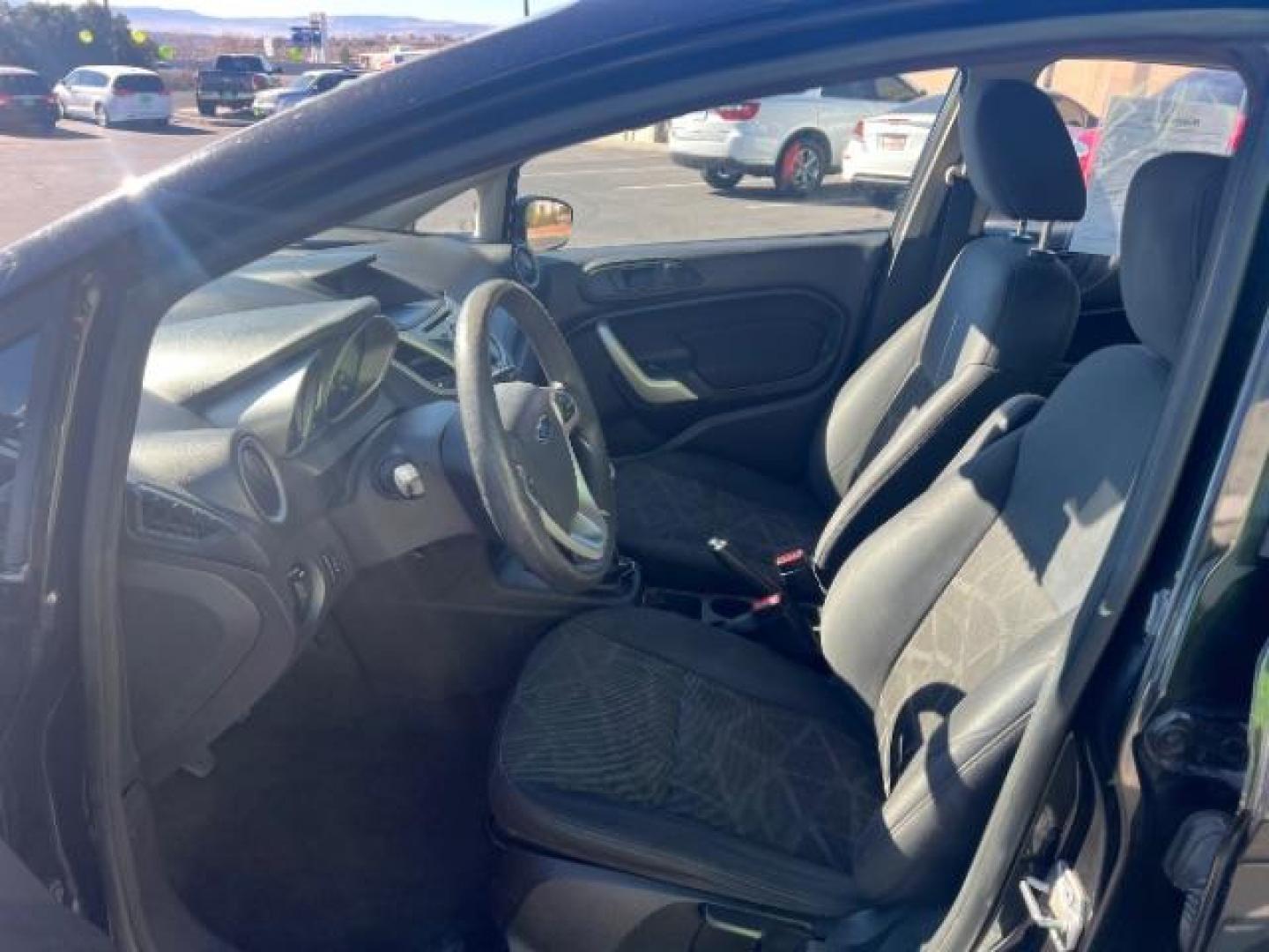 2012 Tuxedo Black Metallic /Charcoal Black/Light Stone Ford Fiesta SE (3FADP4BJ3CM) with an 1.6L I-4 DOHC engine, 5-Speed Manual transmission, located at 1865 East Red Hills Pkwy, St. George, 84770, (435) 628-0023, 37.120850, -113.543640 - Photo#13