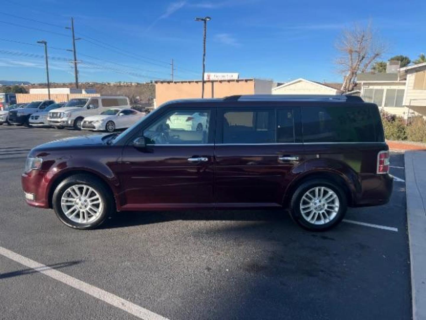 2018 Burgundy Velvet Tinted Clearcoat /Dune Ford Flex SEL (2FMGK5C87JB) with an 3.5L V6 DOHC 24V engine, 6-Speed Automatic transmission, located at 940 North Main Street, Cedar City, UT, 84720, (435) 628-0023, 37.692936, -113.061897 - Photo#3