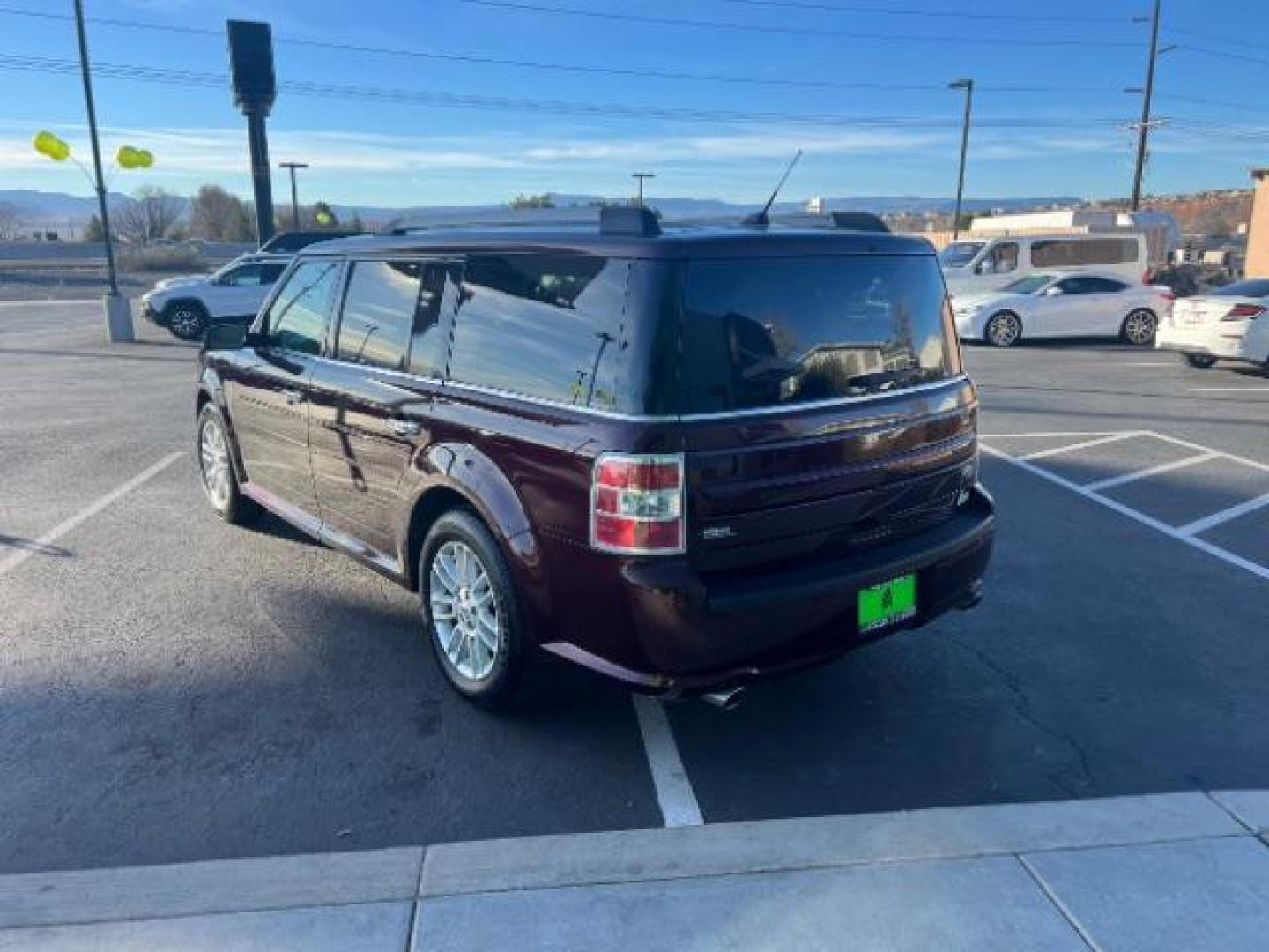 2018 Burgundy Velvet Tinted Clearcoat /Dune Ford Flex SEL (2FMGK5C87JB) with an 3.5L V6 DOHC 24V engine, 6-Speed Automatic transmission, located at 940 North Main Street, Cedar City, UT, 84720, (435) 628-0023, 37.692936, -113.061897 - Photo#4