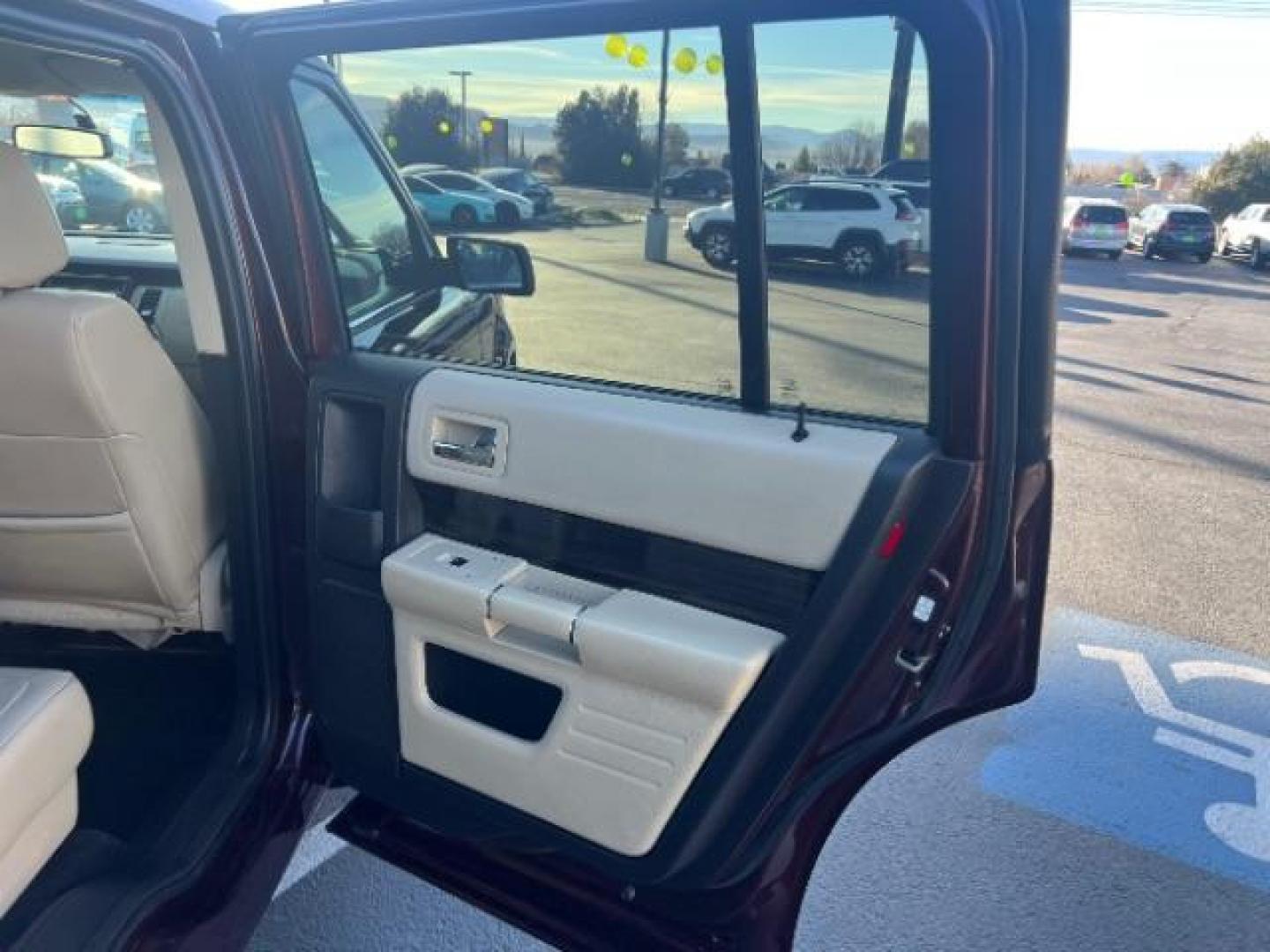 2018 Burgundy Velvet Tinted Clearcoat /Dune Ford Flex SEL (2FMGK5C87JB) with an 3.5L V6 DOHC 24V engine, 6-Speed Automatic transmission, located at 940 North Main Street, Cedar City, UT, 84720, (435) 628-0023, 37.692936, -113.061897 - Photo#28