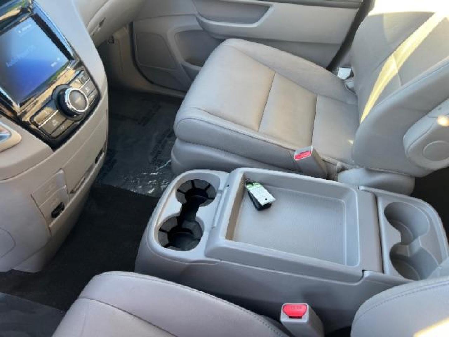 2014 Celestial Blue Metallic /Truffle Honda Odyssey EX-L (5FNRL5H62EB) with an 3.5L V6 SOHC 24V engine, 6-Speed Automatic transmission, located at 940 North Main Street, Cedar City, UT, 84720, (435) 628-0023, 37.692936, -113.061897 - Photo#19