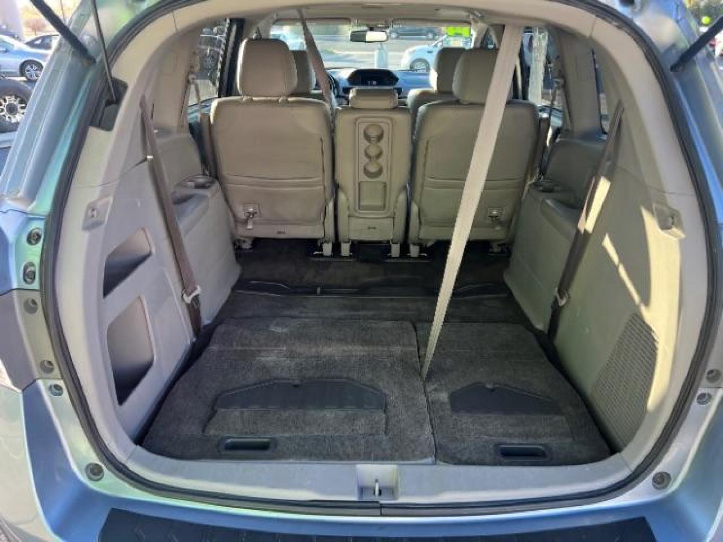 2014 Celestial Blue Metallic /Truffle Honda Odyssey EX-L (5FNRL5H62EB) with an 3.5L V6 SOHC 24V engine, 6-Speed Automatic transmission, located at 940 North Main Street, Cedar City, UT, 84720, (435) 628-0023, 37.692936, -113.061897 - Photo#26