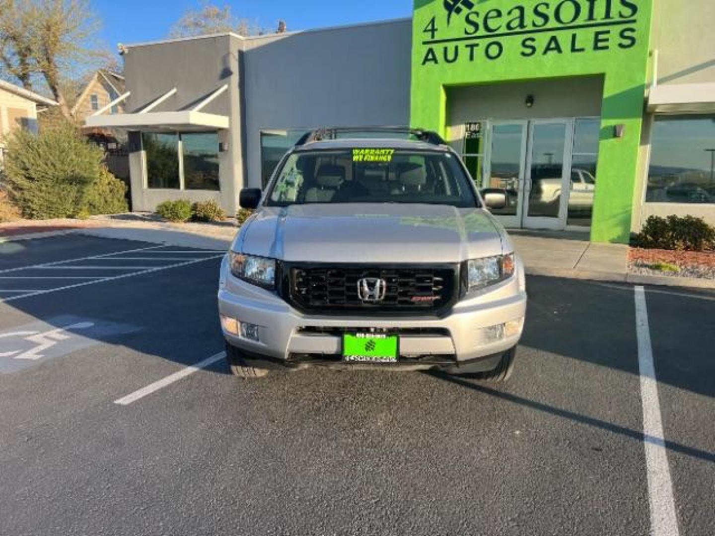 2013 Alabaster Silver Metallic /Black Honda Ridgeline Sport (5FPYK1F75DB) with an 3.5L V-6 variable valve control engine, Continuously Variable Transmission transmission, located at 940 North Main Street, Cedar City, UT, 84720, (435) 628-0023, 37.692936, -113.061897 - We specialize in helping ALL people get the best financing available. No matter your credit score, good, bad or none we can get you an amazing rate. Had a bankruptcy, divorce, or repossessions? We give you the green light to get your credit back on the road. Low down and affordable payments that fit - Photo#1