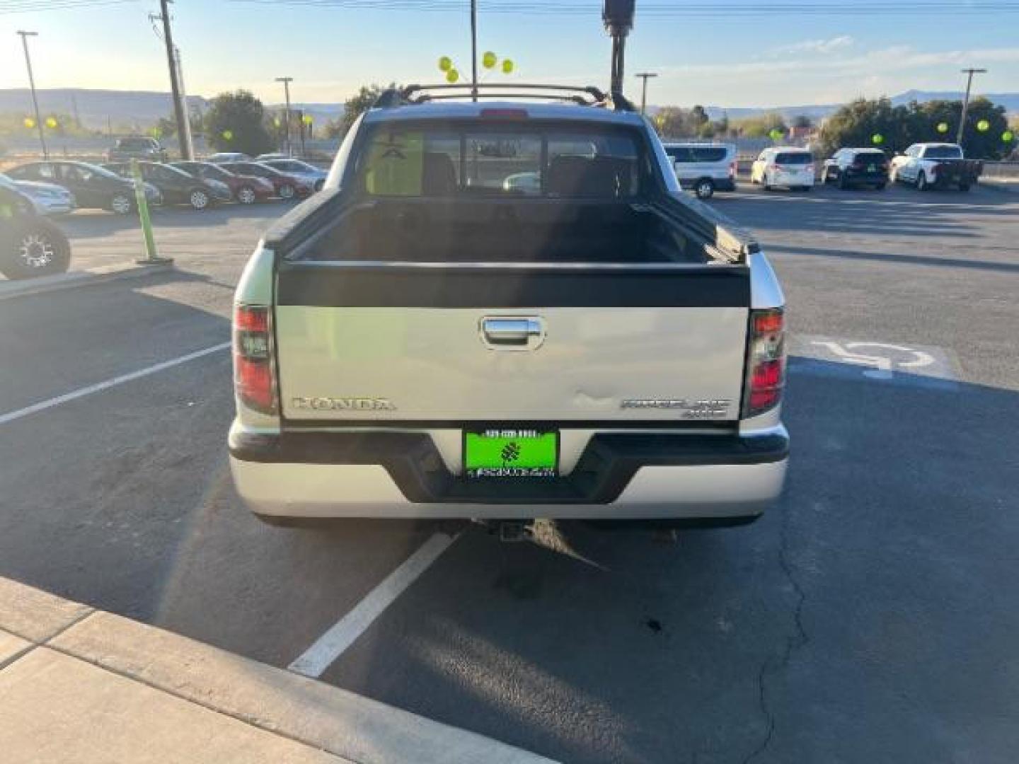 2013 Alabaster Silver Metallic /Black Honda Ridgeline Sport (5FPYK1F75DB) with an 3.5L V-6 variable valve control engine, Continuously Variable Transmission transmission, located at 940 North Main Street, Cedar City, UT, 84720, (435) 628-0023, 37.692936, -113.061897 - We specialize in helping ALL people get the best financing available. No matter your credit score, good, bad or none we can get you an amazing rate. Had a bankruptcy, divorce, or repossessions? We give you the green light to get your credit back on the road. Low down and affordable payments that fit - Photo#5