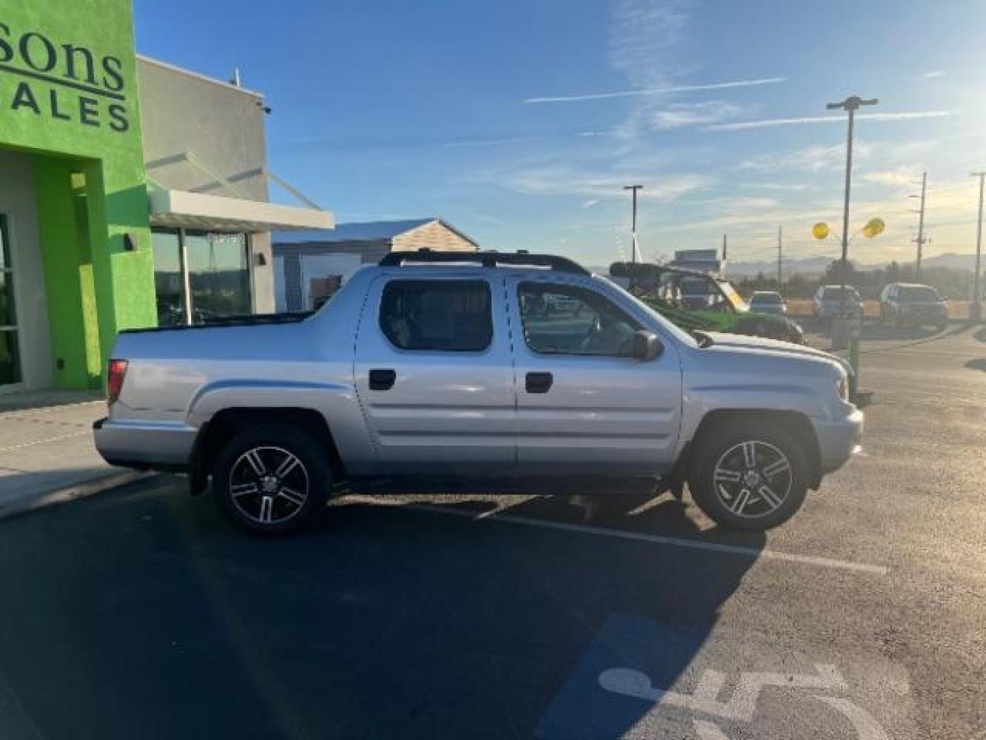 2013 Alabaster Silver Metallic /Black Honda Ridgeline Sport (5FPYK1F75DB) with an 3.5L V-6 variable valve control engine, Continuously Variable Transmission transmission, located at 940 North Main Street, Cedar City, UT, 84720, (435) 628-0023, 37.692936, -113.061897 - We specialize in helping ALL people get the best financing available. No matter your credit score, good, bad or none we can get you an amazing rate. Had a bankruptcy, divorce, or repossessions? We give you the green light to get your credit back on the road. Low down and affordable payments that fit - Photo#7