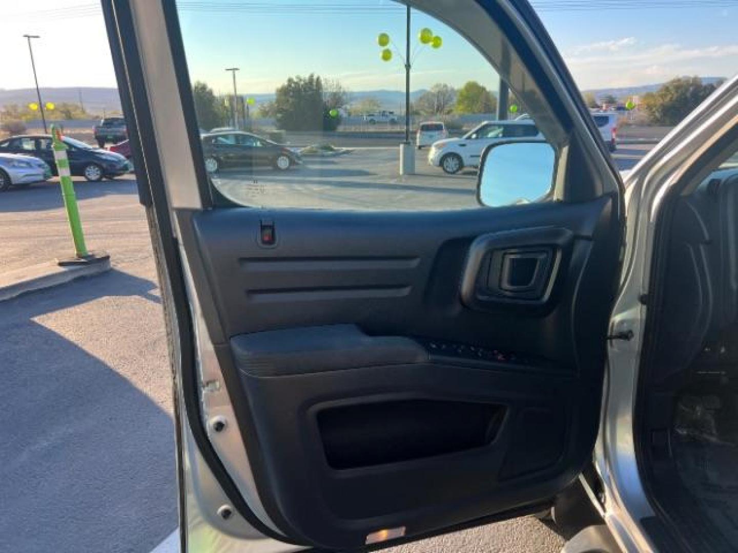 2013 Alabaster Silver Metallic /Black Honda Ridgeline Sport (5FPYK1F75DB) with an 3.5L V-6 variable valve control engine, Continuously Variable Transmission transmission, located at 940 North Main Street, Cedar City, UT, 84720, (435) 628-0023, 37.692936, -113.061897 - We specialize in helping ALL people get the best financing available. No matter your credit score, good, bad or none we can get you an amazing rate. Had a bankruptcy, divorce, or repossessions? We give you the green light to get your credit back on the road. Low down and affordable payments that fit - Photo#12