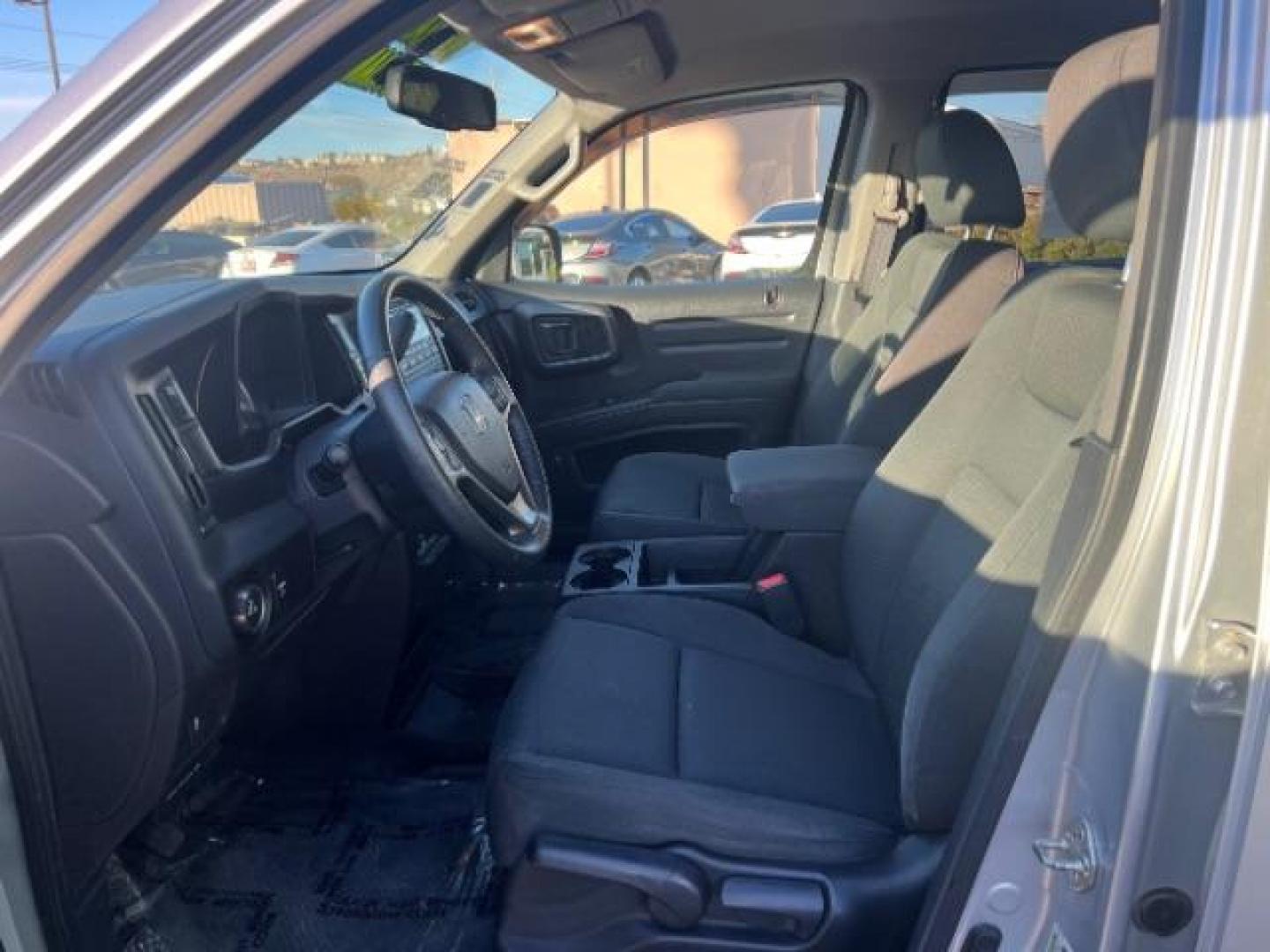 2013 Alabaster Silver Metallic /Black Honda Ridgeline Sport (5FPYK1F75DB) with an 3.5L V-6 variable valve control engine, Continuously Variable Transmission transmission, located at 940 North Main Street, Cedar City, UT, 84720, (435) 628-0023, 37.692936, -113.061897 - We specialize in helping ALL people get the best financing available. No matter your credit score, good, bad or none we can get you an amazing rate. Had a bankruptcy, divorce, or repossessions? We give you the green light to get your credit back on the road. Low down and affordable payments that fit - Photo#14