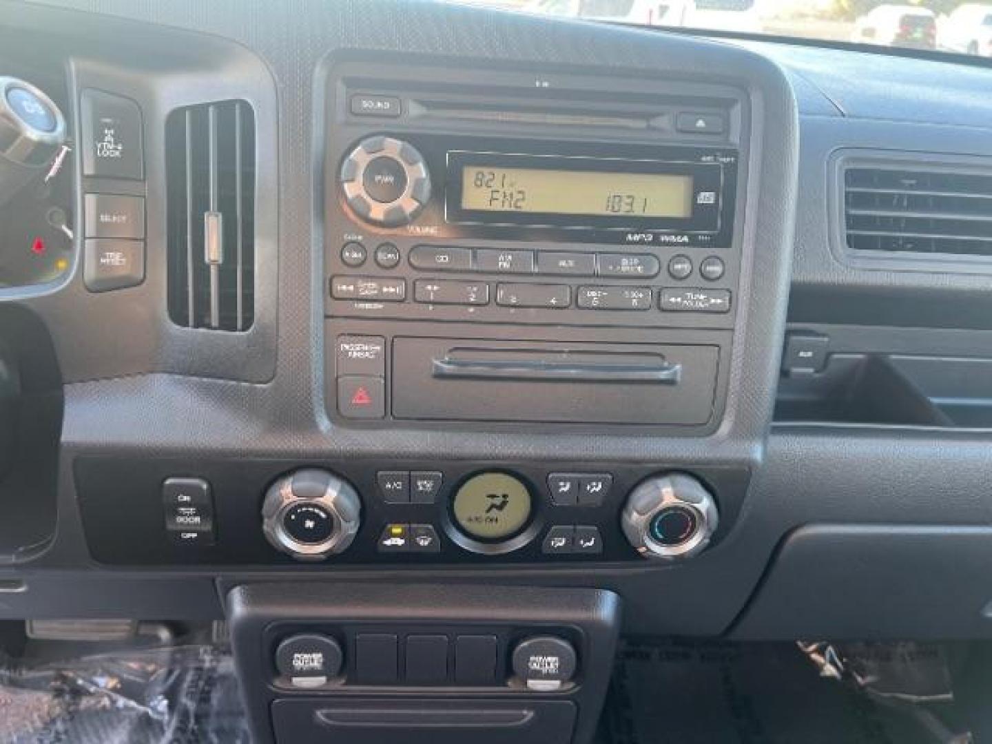2013 Alabaster Silver Metallic /Black Honda Ridgeline Sport (5FPYK1F75DB) with an 3.5L V-6 variable valve control engine, Continuously Variable Transmission transmission, located at 940 North Main Street, Cedar City, UT, 84720, (435) 628-0023, 37.692936, -113.061897 - We specialize in helping ALL people get the best financing available. No matter your credit score, good, bad or none we can get you an amazing rate. Had a bankruptcy, divorce, or repossessions? We give you the green light to get your credit back on the road. Low down and affordable payments that fit - Photo#18