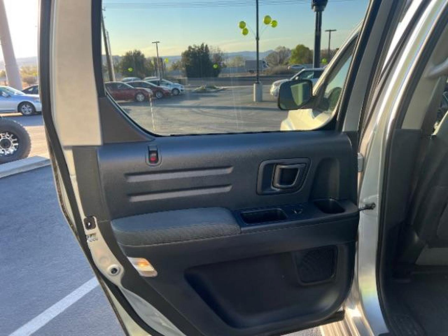 2013 Alabaster Silver Metallic /Black Honda Ridgeline Sport (5FPYK1F75DB) with an 3.5L V-6 variable valve control engine, Continuously Variable Transmission transmission, located at 940 North Main Street, Cedar City, UT, 84720, (435) 628-0023, 37.692936, -113.061897 - We specialize in helping ALL people get the best financing available. No matter your credit score, good, bad or none we can get you an amazing rate. Had a bankruptcy, divorce, or repossessions? We give you the green light to get your credit back on the road. Low down and affordable payments that fit - Photo#20