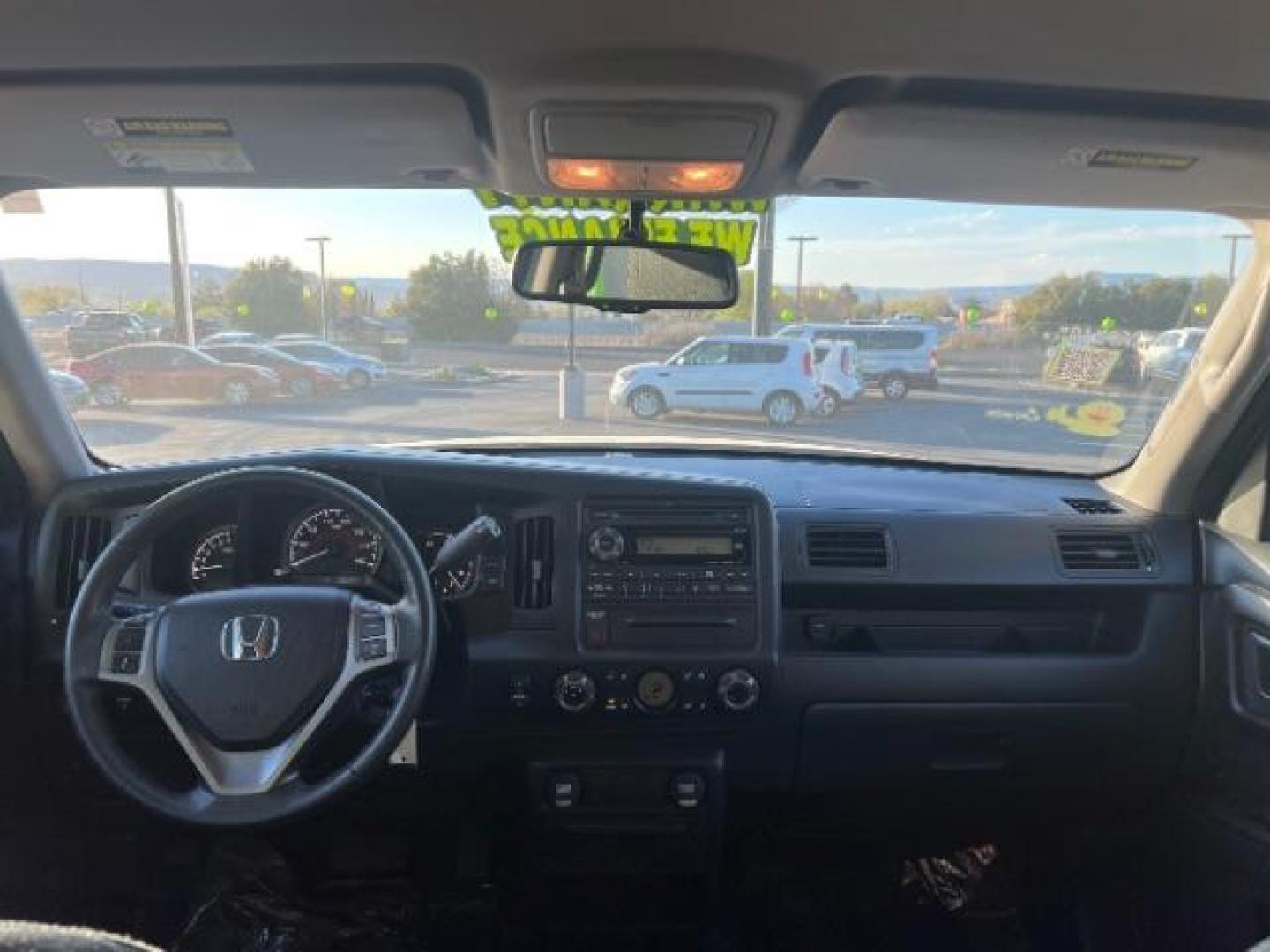 2013 Alabaster Silver Metallic /Black Honda Ridgeline Sport (5FPYK1F75DB) with an 3.5L V-6 variable valve control engine, Continuously Variable Transmission transmission, located at 940 North Main Street, Cedar City, UT, 84720, (435) 628-0023, 37.692936, -113.061897 - We specialize in helping ALL people get the best financing available. No matter your credit score, good, bad or none we can get you an amazing rate. Had a bankruptcy, divorce, or repossessions? We give you the green light to get your credit back on the road. Low down and affordable payments that fit - Photo#23