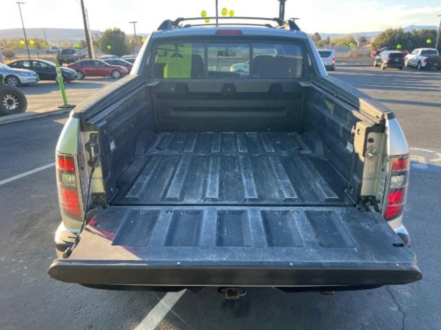 2013 Alabaster Silver Metallic /Black Honda Ridgeline Sport (5FPYK1F75DB) with an 3.5L V-6 variable valve control engine, Continuously Variable Transmission transmission, located at 940 North Main Street, Cedar City, UT, 84720, (435) 628-0023, 37.692936, -113.061897 - We specialize in helping ALL people get the best financing available. No matter your credit score, good, bad or none we can get you an amazing rate. Had a bankruptcy, divorce, or repossessions? We give you the green light to get your credit back on the road. Low down and affordable payments that fit - Photo#24