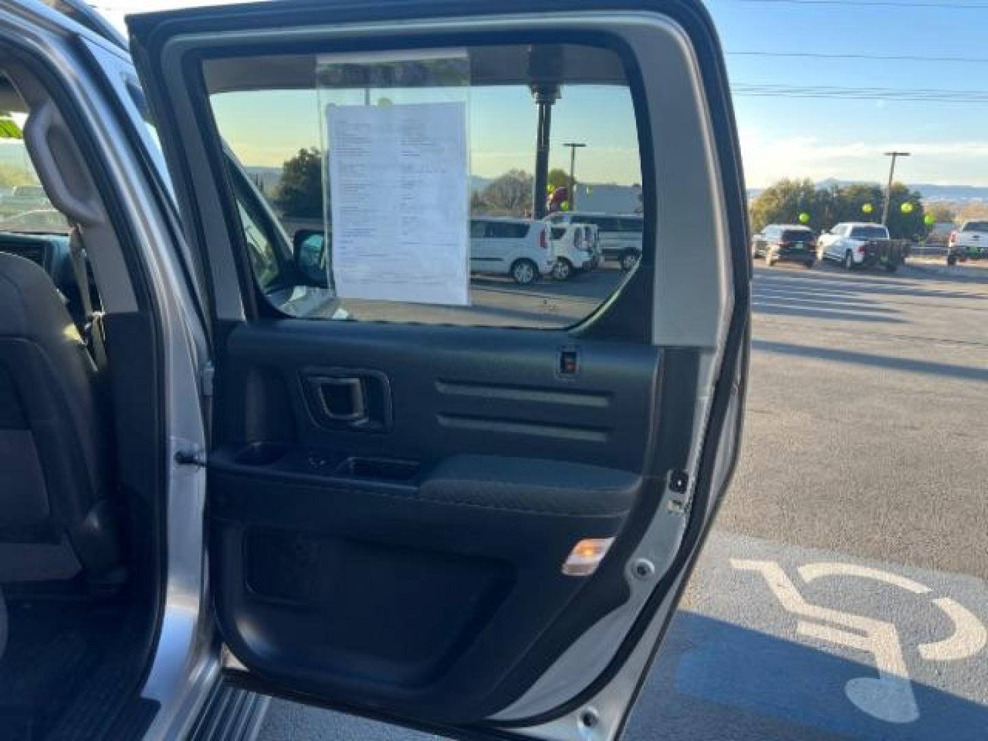 2013 Alabaster Silver Metallic /Black Honda Ridgeline Sport (5FPYK1F75DB) with an 3.5L V-6 variable valve control engine, Continuously Variable Transmission transmission, located at 940 North Main Street, Cedar City, UT, 84720, (435) 628-0023, 37.692936, -113.061897 - We specialize in helping ALL people get the best financing available. No matter your credit score, good, bad or none we can get you an amazing rate. Had a bankruptcy, divorce, or repossessions? We give you the green light to get your credit back on the road. Low down and affordable payments that fit - Photo#25