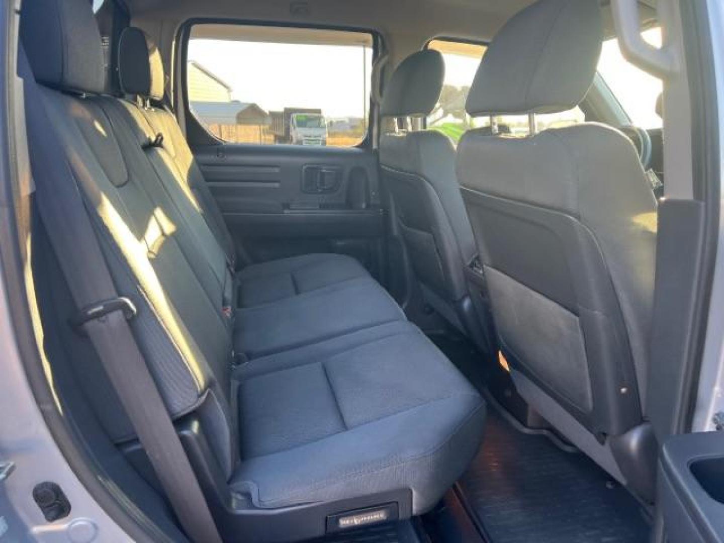 2013 Alabaster Silver Metallic /Black Honda Ridgeline Sport (5FPYK1F75DB) with an 3.5L V-6 variable valve control engine, Continuously Variable Transmission transmission, located at 940 North Main Street, Cedar City, UT, 84720, (435) 628-0023, 37.692936, -113.061897 - We specialize in helping ALL people get the best financing available. No matter your credit score, good, bad or none we can get you an amazing rate. Had a bankruptcy, divorce, or repossessions? We give you the green light to get your credit back on the road. Low down and affordable payments that fit - Photo#26