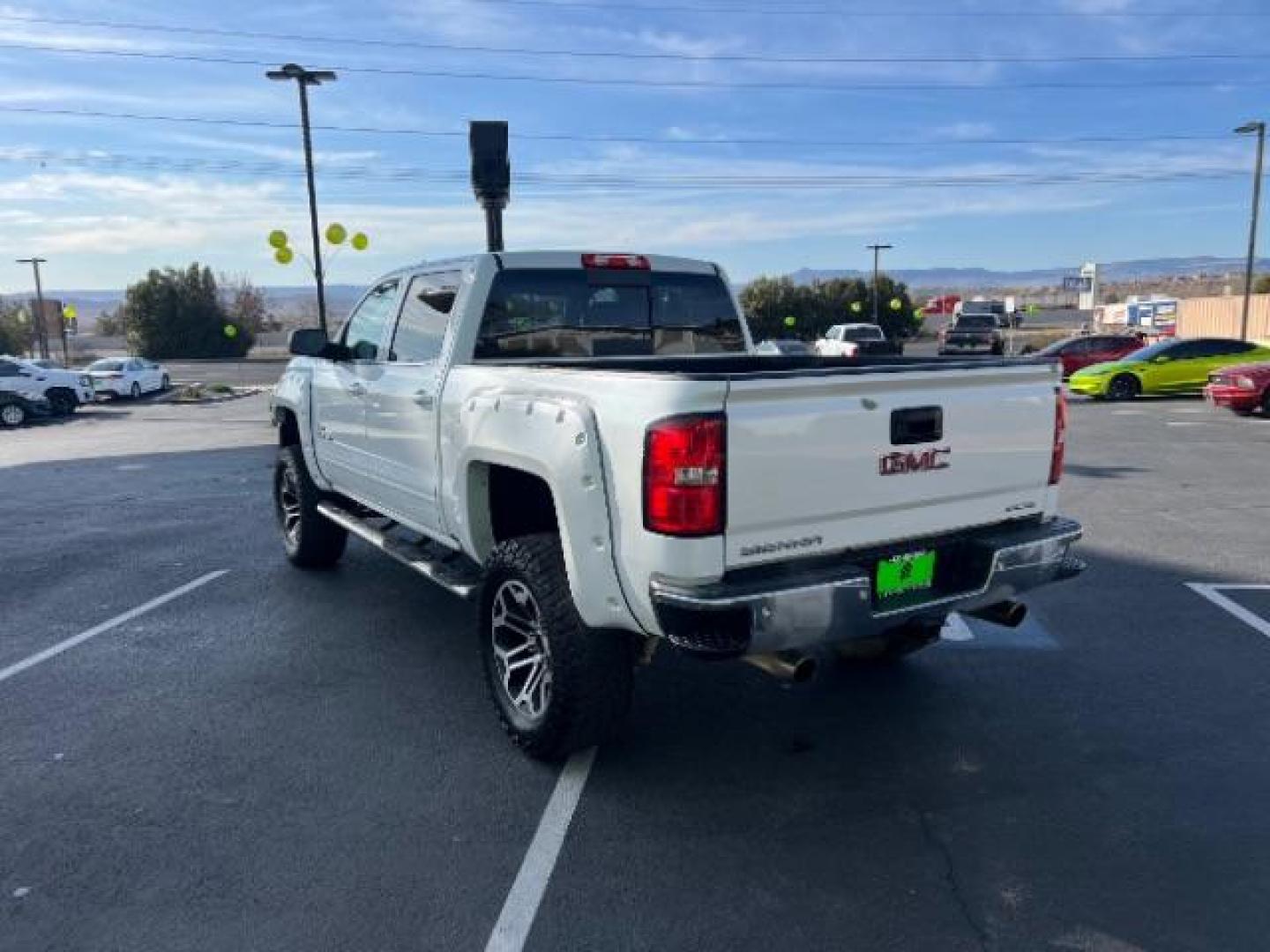 2016 Summit White /Dark Ash/Jet Black GMC Sierra 1500 SLE (3GTU2MEC1GG) with an EcoTec3 5.3L V-8 gasoline direct injection engine, Continuously Variable Transmission transmission, located at 1865 East Red Hills Pkwy, St. George, 84770, (435) 628-0023, 37.120850, -113.543640 - Photo#4