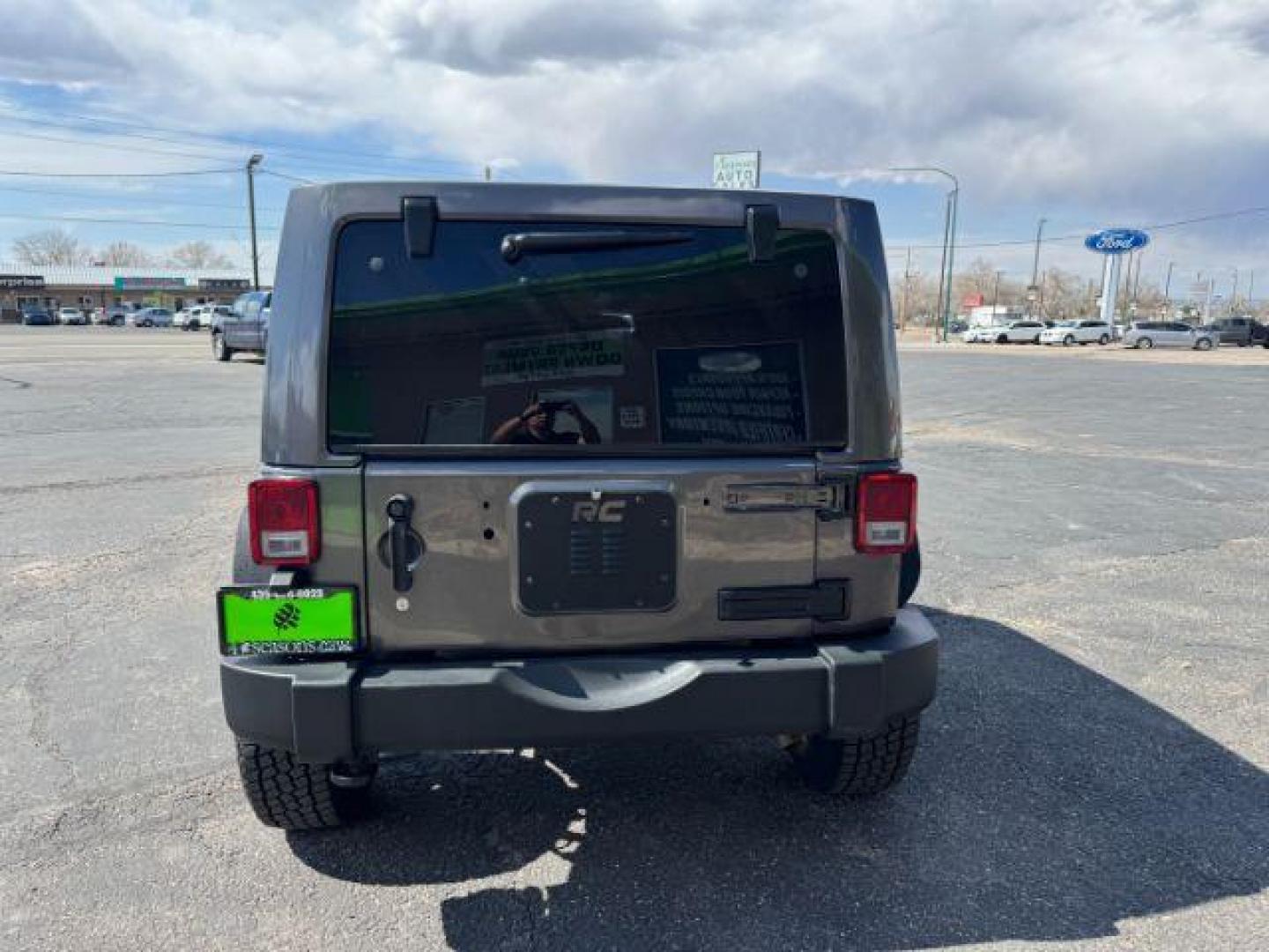 2018 Granite Crystal Metallic Clearcoat /Black Jeep Wrangler JK Unlimited Sport S 4x4 (1C4BJWDG5JL) with an Pentastar 3.6L V-6 DOHC engine, Continuously Variable Transmission transmission, located at 1865 East Red Hills Pkwy, St. George, 84770, (435) 628-0023, 37.120850, -113.543640 - We specialize in helping ALL people get the best financing available. No matter your credit score, good, bad or none we can get you an amazing rate. Had a bankruptcy, divorce, or repossessions? We give you the green light to get your credit back on the road. Low down and affordable payments that fit - Photo#6