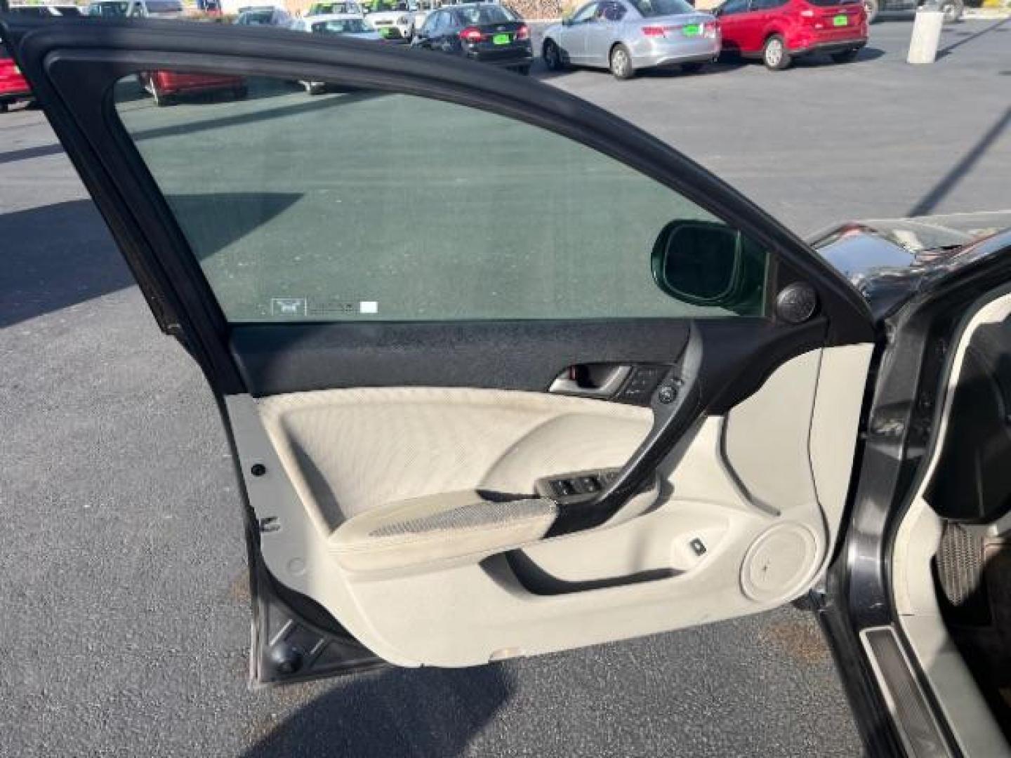 2009 Grigio Metallic /Ebony Leather Interior Acura TSX 5-Speed AT with Tech Package (JH4CU26699C) with an 2.4L L4 DOHC 16V engine, 5-Speed Automatic transmission, located at 1865 East Red Hills Pkwy, St. George, 84770, (435) 628-0023, 37.120850, -113.543640 - This vehicle is a Mechanic Special. This means it will need some love. Runs a drives fine but has body damage, leaks or other mechanical issues. It did NOT pass our 50 point inspection. Get a great deal on a less than perfect car. These cars do NOT qualify for our in house financing. Cash and carry, - Photo#8