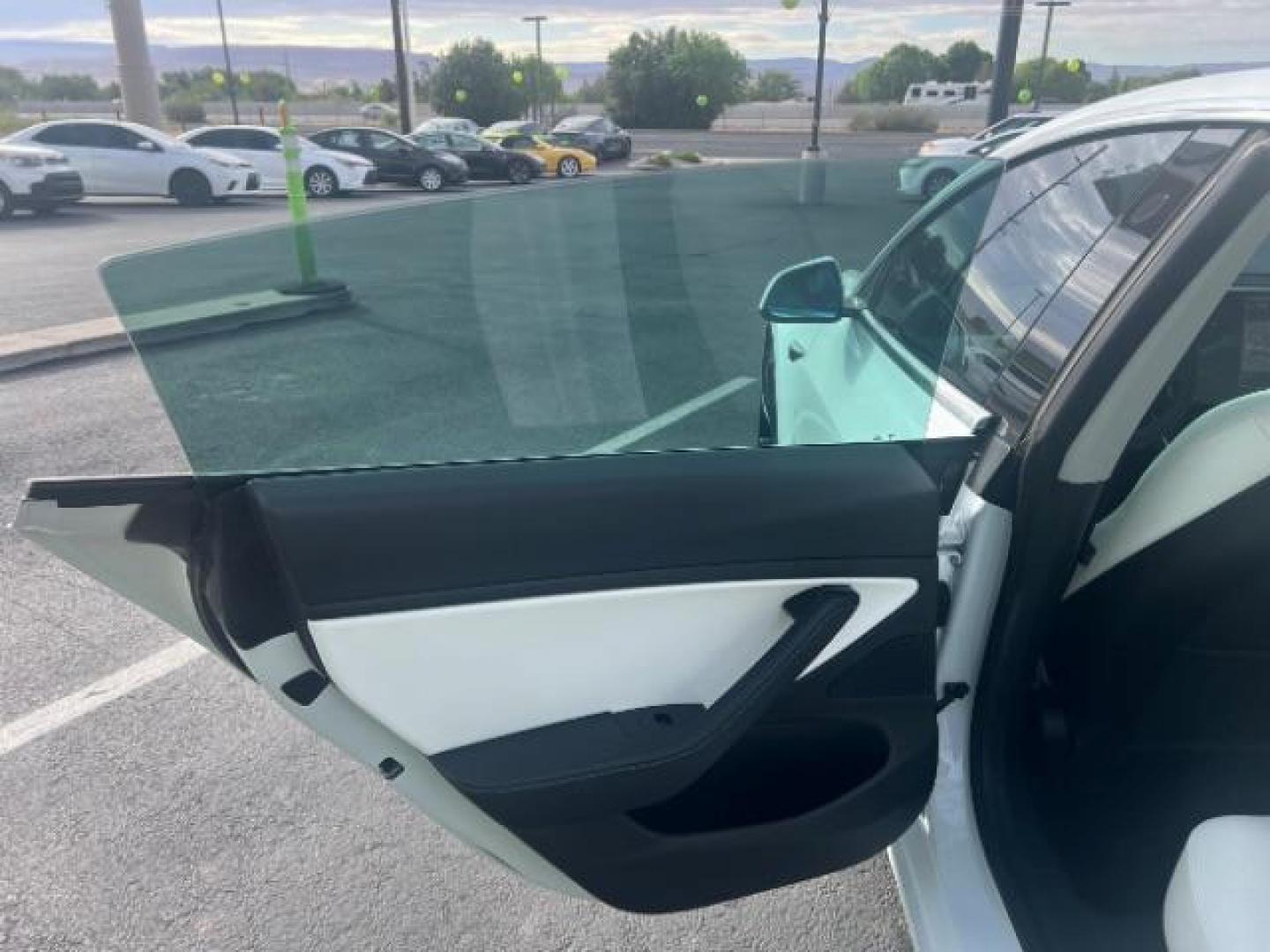 2020 Pearl White Multi-Coat /White/Black Tesla Model 3 Performance Dual Motor All-Wheel Drive (5YJ3E1EC1LF) with an ELECTRIC engine, Continuously Variable Transmission transmission, located at 940 North Main Street, Cedar City, UT, 84720, (435) 628-0023, 37.692936, -113.061897 - ****Price includes $4k IRS EV REBATE**** We are setup with IRS to file the rebate directly and take credit off the price of car. Check with IRS EV website to be sure you qualify. Trump has threatened to end rebate so ACT FAST! Full Self Drivnig Subscription PAID FOR! $8k value. Has small chips - Photo#20
