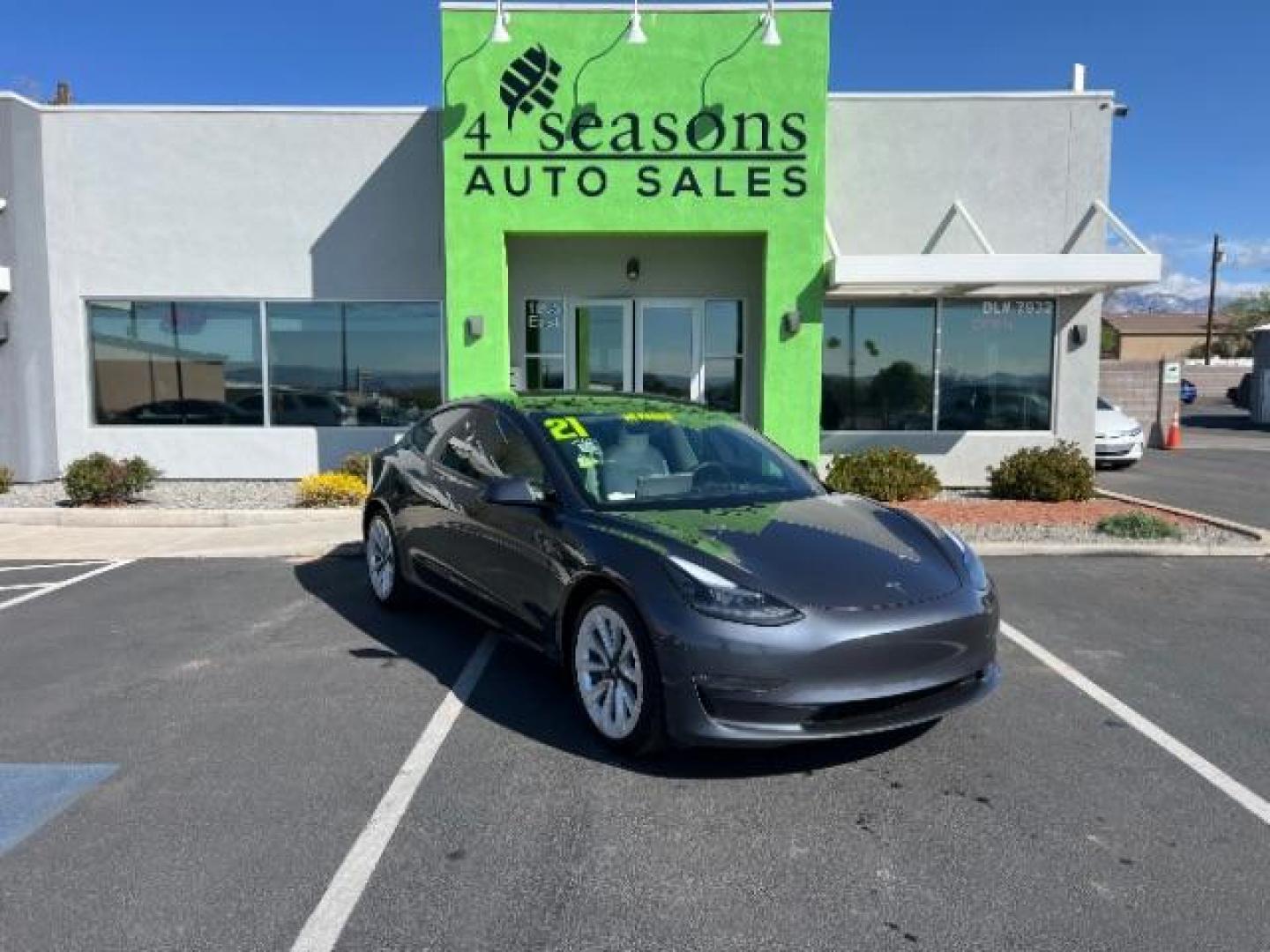 2021 Midnight Silver Metallic /White/Black Tesla Model 3 Long Range Dual Motor All-Wheel Drive (5YJ3E1EB5MF) with an 1.4L L4 DOHC 16V PLUG-IN HYBRID engine, Continuously Variable Transmission transmission, located at 1865 East Red Hills Pkwy, St. George, 84770, (435) 628-0023, 37.120850, -113.543640 - ***PRICE INCLUDES $4k EV REBATE*** Check with IRS website to be sure you qualify for the credit. Excellent condition, LONG RANGE AWD Full motor and battery warranty up to 120k miles. Financing for ALL credit types. Call our stop by. 4 Seasons Auto Southern Utah EV experts! - Photo#0