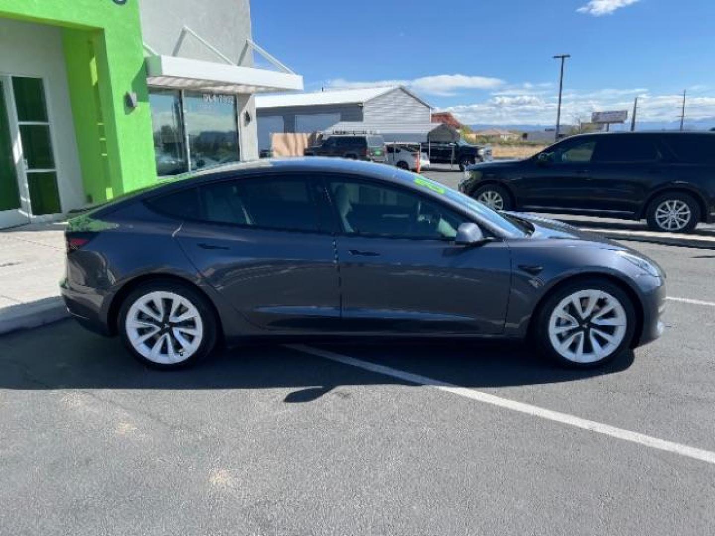 2021 Midnight Silver Metallic /White/Black Tesla Model 3 Long Range Dual Motor All-Wheel Drive (5YJ3E1EB5MF) with an 1.4L L4 DOHC 16V PLUG-IN HYBRID engine, Continuously Variable Transmission transmission, located at 1865 East Red Hills Pkwy, St. George, 84770, (435) 628-0023, 37.120850, -113.543640 - ***PRICE INCLUDES $4k EV REBATE*** Check with IRS website to be sure you qualify for the credit. Excellent condition, LONG RANGE AWD Full motor and battery warranty up to 120k miles. Financing for ALL credit types. Call our stop by. 4 Seasons Auto Southern Utah EV experts! - Photo#5