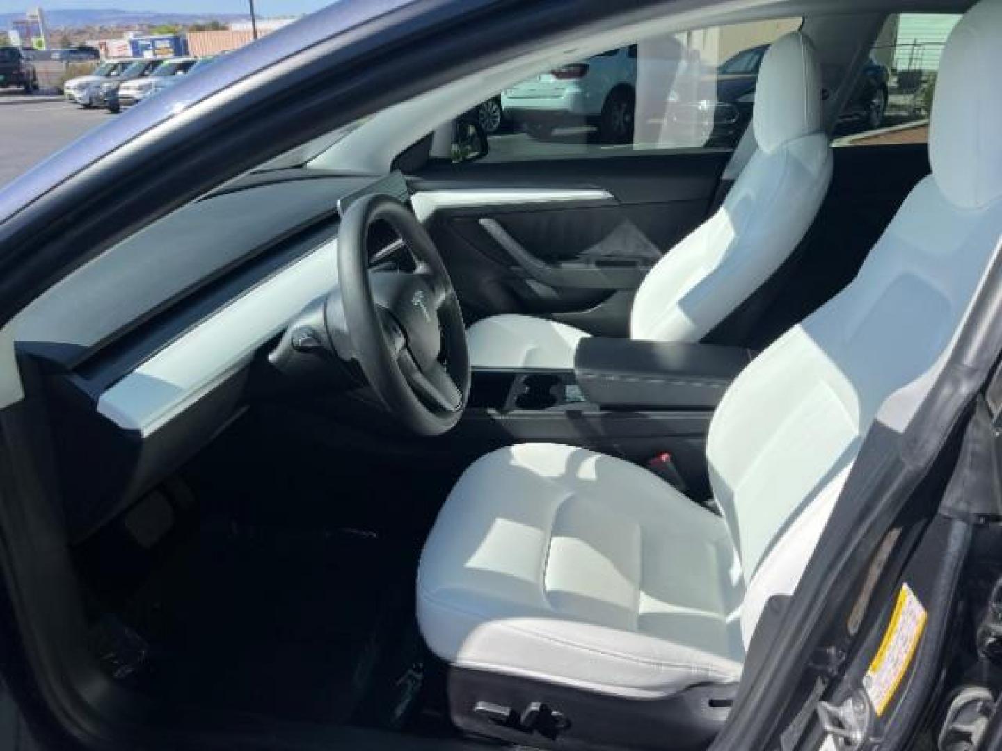 2021 Midnight Silver Metallic /White/Black Tesla Model 3 Long Range Dual Motor All-Wheel Drive (5YJ3E1EB5MF) with an 1.4L L4 DOHC 16V PLUG-IN HYBRID engine, Continuously Variable Transmission transmission, located at 1865 East Red Hills Pkwy, St. George, 84770, (435) 628-0023, 37.120850, -113.543640 - ***PRICE INCLUDES $4k EV REBATE*** Check with IRS website to be sure you qualify for the credit. Excellent condition, LONG RANGE AWD Full motor and battery warranty up to 120k miles. Financing for ALL credit types. Call our stop by. 4 Seasons Auto Southern Utah EV experts! - Photo#16
