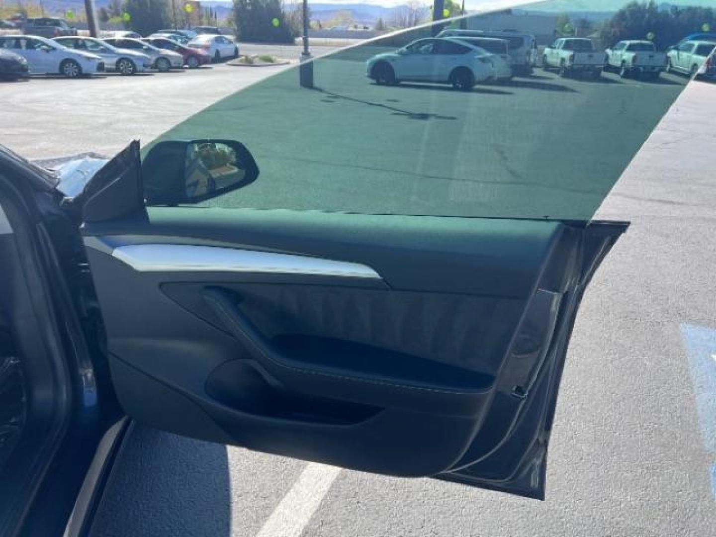 2021 Midnight Silver Metallic /White/Black Tesla Model 3 Long Range Dual Motor All-Wheel Drive (5YJ3E1EB5MF) with an 1.4L L4 DOHC 16V PLUG-IN HYBRID engine, Continuously Variable Transmission transmission, located at 1865 East Red Hills Pkwy, St. George, 84770, (435) 628-0023, 37.120850, -113.543640 - ***PRICE INCLUDES $4k EV REBATE*** Check with IRS website to be sure you qualify for the credit. Excellent condition, LONG RANGE AWD Full motor and battery warranty up to 120k miles. Financing for ALL credit types. Call our stop by. 4 Seasons Auto Southern Utah EV experts! - Photo#23