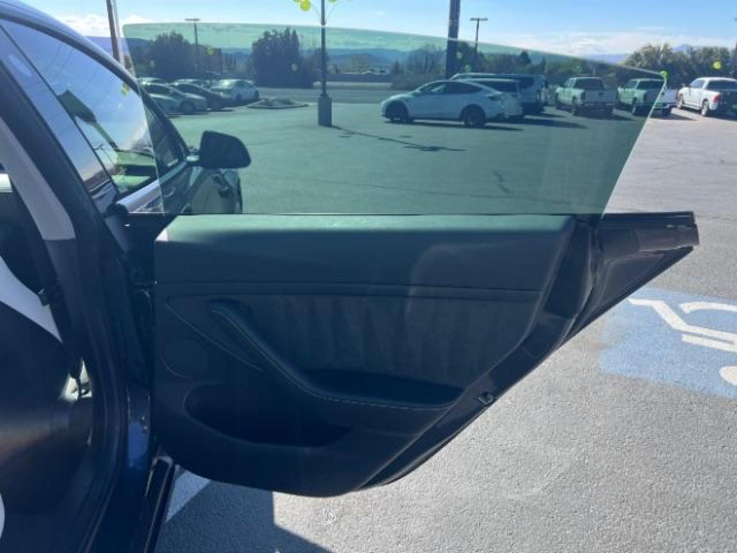 2021 Midnight Silver Metallic /White/Black Tesla Model 3 Long Range Dual Motor All-Wheel Drive (5YJ3E1EB5MF) with an 1.4L L4 DOHC 16V PLUG-IN HYBRID engine, Continuously Variable Transmission transmission, located at 1865 East Red Hills Pkwy, St. George, 84770, (435) 628-0023, 37.120850, -113.543640 - ***PRICE INCLUDES $4k EV REBATE*** Check with IRS website to be sure you qualify for the credit. Excellent condition, LONG RANGE AWD Full motor and battery warranty up to 120k miles. Financing for ALL credit types. Call our stop by. 4 Seasons Auto Southern Utah EV experts! - Photo#25