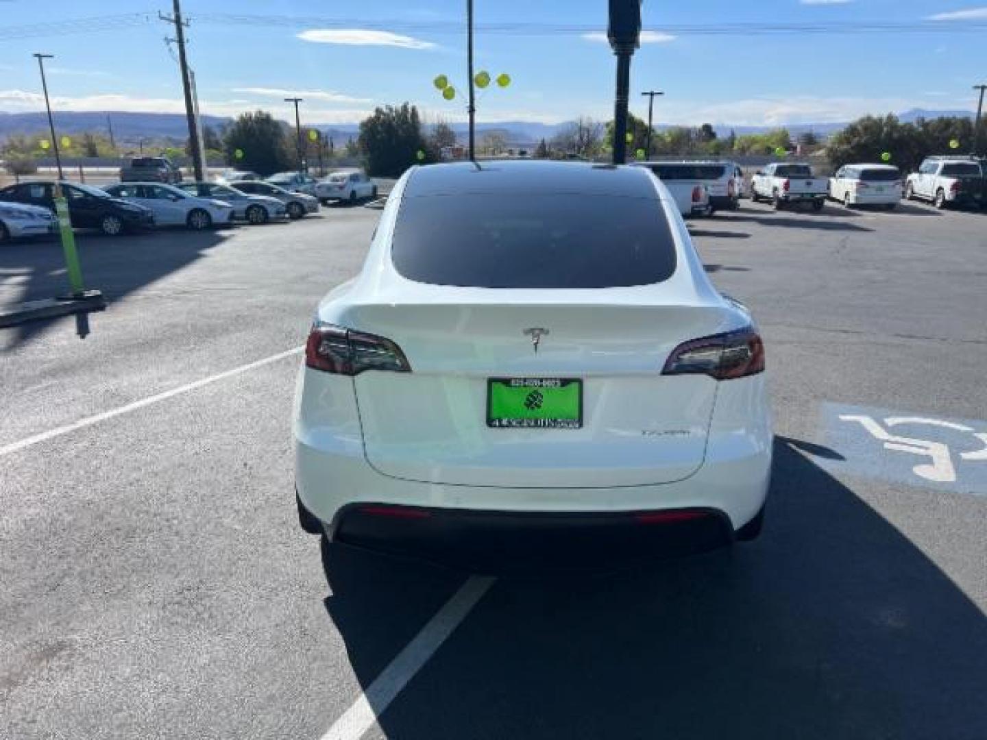 2021 Pearl White Multi-Coat /Black Tesla Model Y Long Range Dual Motor All-Wheel Drive (5YJYGDEE9MF) with an 1.4L L4 DOHC 16V PLUG-IN HYBRID engine, Continuously Variable Transmission transmission, located at 1865 East Red Hills Pkwy, St. George, 84770, (435) 628-0023, 37.120850, -113.543640 - ***PRICE INCLUDES $4k EV REBATE*** Check with IRS website to be sure you qualify for the credit. Excellent condition, LONG RANGE AWD Full motor and battery warranty up to 120k miles. Financing for ALL credit types. Call our stop by. 4 Seasons Auto Southern Utah EV experts! - Photo#7