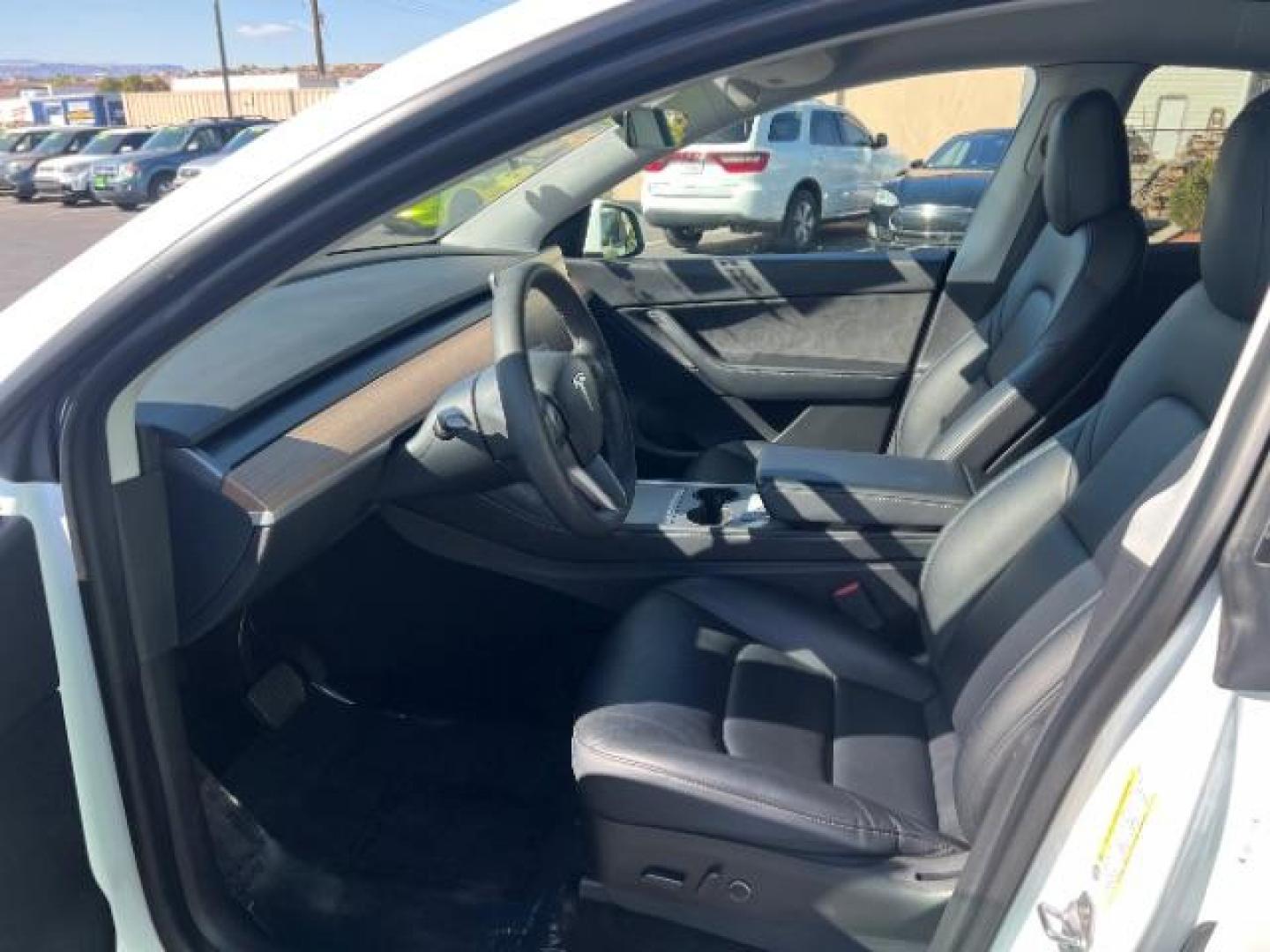 2021 Pearl White Multi-Coat /Black Tesla Model Y Long Range Dual Motor All-Wheel Drive (5YJYGDEE9MF) with an 1.4L L4 DOHC 16V PLUG-IN HYBRID engine, Continuously Variable Transmission transmission, located at 1865 East Red Hills Pkwy, St. George, 84770, (435) 628-0023, 37.120850, -113.543640 - ***PRICE INCLUDES $4k EV REBATE*** Check with IRS website to be sure you qualify for the credit. Excellent condition, LONG RANGE AWD Full motor and battery warranty up to 120k miles. Financing for ALL credit types. Call our stop by. 4 Seasons Auto Southern Utah EV experts! - Photo#16