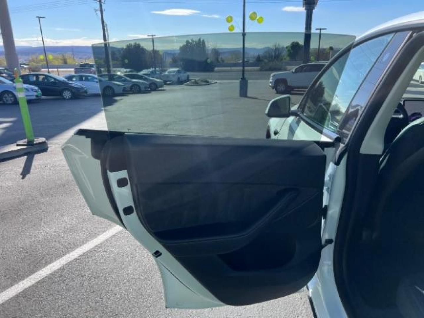 2021 Pearl White Multi-Coat /Black Tesla Model Y Long Range Dual Motor All-Wheel Drive (5YJYGDEE9MF) with an 1.4L L4 DOHC 16V PLUG-IN HYBRID engine, Continuously Variable Transmission transmission, located at 1865 East Red Hills Pkwy, St. George, 84770, (435) 628-0023, 37.120850, -113.543640 - ***PRICE INCLUDES $4k EV REBATE*** Check with IRS website to be sure you qualify for the credit. Excellent condition, LONG RANGE AWD Full motor and battery warranty up to 120k miles. Financing for ALL credit types. Call our stop by. 4 Seasons Auto Southern Utah EV experts! - Photo#18