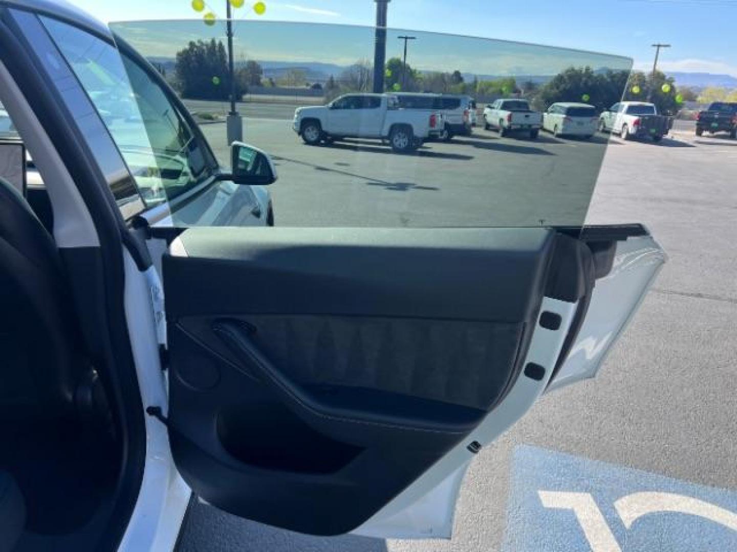 2021 Pearl White Multi-Coat /Black Tesla Model Y Long Range Dual Motor All-Wheel Drive (5YJYGDEE9MF) with an 1.4L L4 DOHC 16V PLUG-IN HYBRID engine, Continuously Variable Transmission transmission, located at 1865 East Red Hills Pkwy, St. George, 84770, (435) 628-0023, 37.120850, -113.543640 - ***PRICE INCLUDES $4k EV REBATE*** Check with IRS website to be sure you qualify for the credit. Excellent condition, LONG RANGE AWD Full motor and battery warranty up to 120k miles. Financing for ALL credit types. Call our stop by. 4 Seasons Auto Southern Utah EV experts! - Photo#23