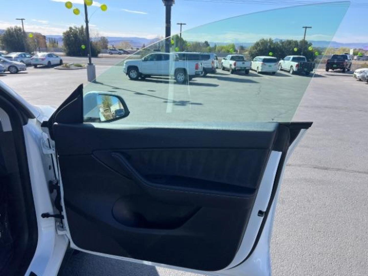 2021 Pearl White Multi-Coat /Black Tesla Model Y Long Range Dual Motor All-Wheel Drive (5YJYGDEE9MF) with an 1.4L L4 DOHC 16V PLUG-IN HYBRID engine, Continuously Variable Transmission transmission, located at 1865 East Red Hills Pkwy, St. George, 84770, (435) 628-0023, 37.120850, -113.543640 - ***PRICE INCLUDES $4k EV REBATE*** Check with IRS website to be sure you qualify for the credit. Excellent condition, LONG RANGE AWD Full motor and battery warranty up to 120k miles. Financing for ALL credit types. Call our stop by. 4 Seasons Auto Southern Utah EV experts! - Photo#25