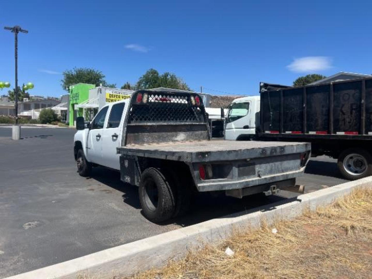 2008 Summit White /Dark Titanium Chevrolet Silverado 3500HD Work Truck (1GCJC33688F) with an Duramax 6.6L V-8 diesel direct injection engine, Automatic transmission, located at 1865 East Red Hills Pkwy, St. George, 84770, (435) 628-0023, 37.120850, -113.543640 - This vehicle is a Mechanic Special. This means it will need some love. Runs a drives fine but has body damage, leaks or other mechanical issues. It did NOT pass our 50 point inspection. Get a great deal on a less than perfect car. These cars do NOT qualify for our in house financing. Cash and carry, - Photo#4