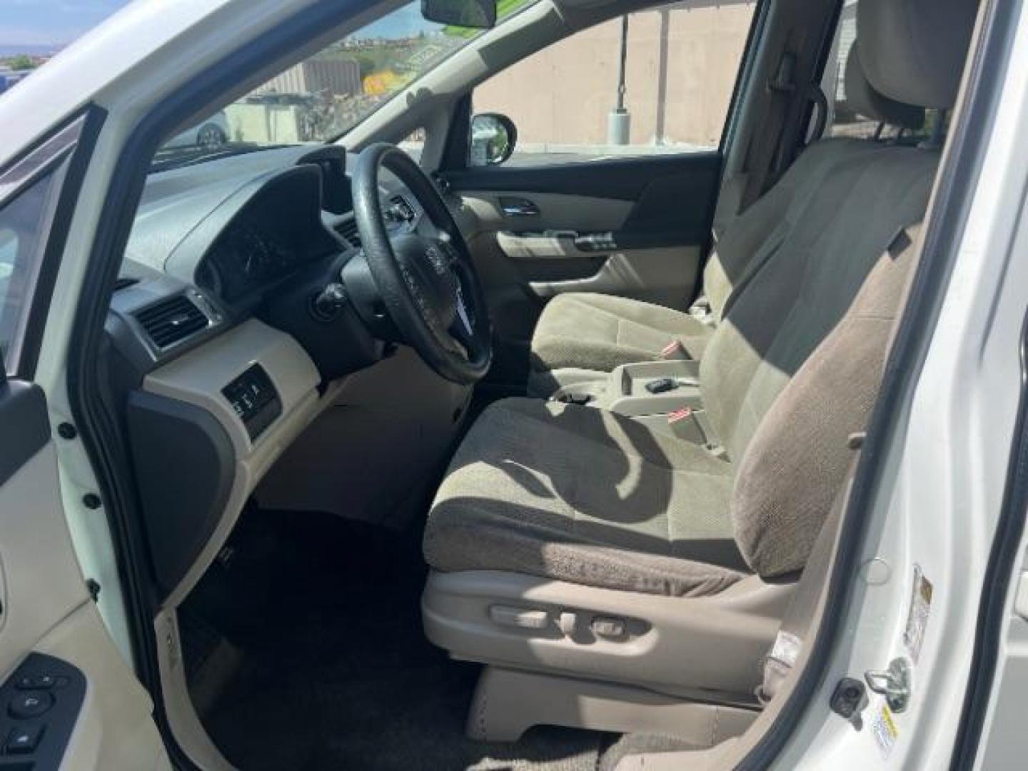 2016 White Diamond Pearl /Beige Honda Odyssey SE (5FNRL5H31GB) with an 3.5L V-6 i-VTEC variable valve control engine, located at 1865 East Red Hills Pkwy, St. George, 84770, (435) 628-0023, 37.120850, -113.543640 - We specialize in helping ALL people get the best financing available. No matter your credit score, good, bad or none we can get you an amazing rate. Had a bankruptcy, divorce, or repossessions? We give you the green light to get your credit back on the road. Low down and affordable payments that fit - Photo#14