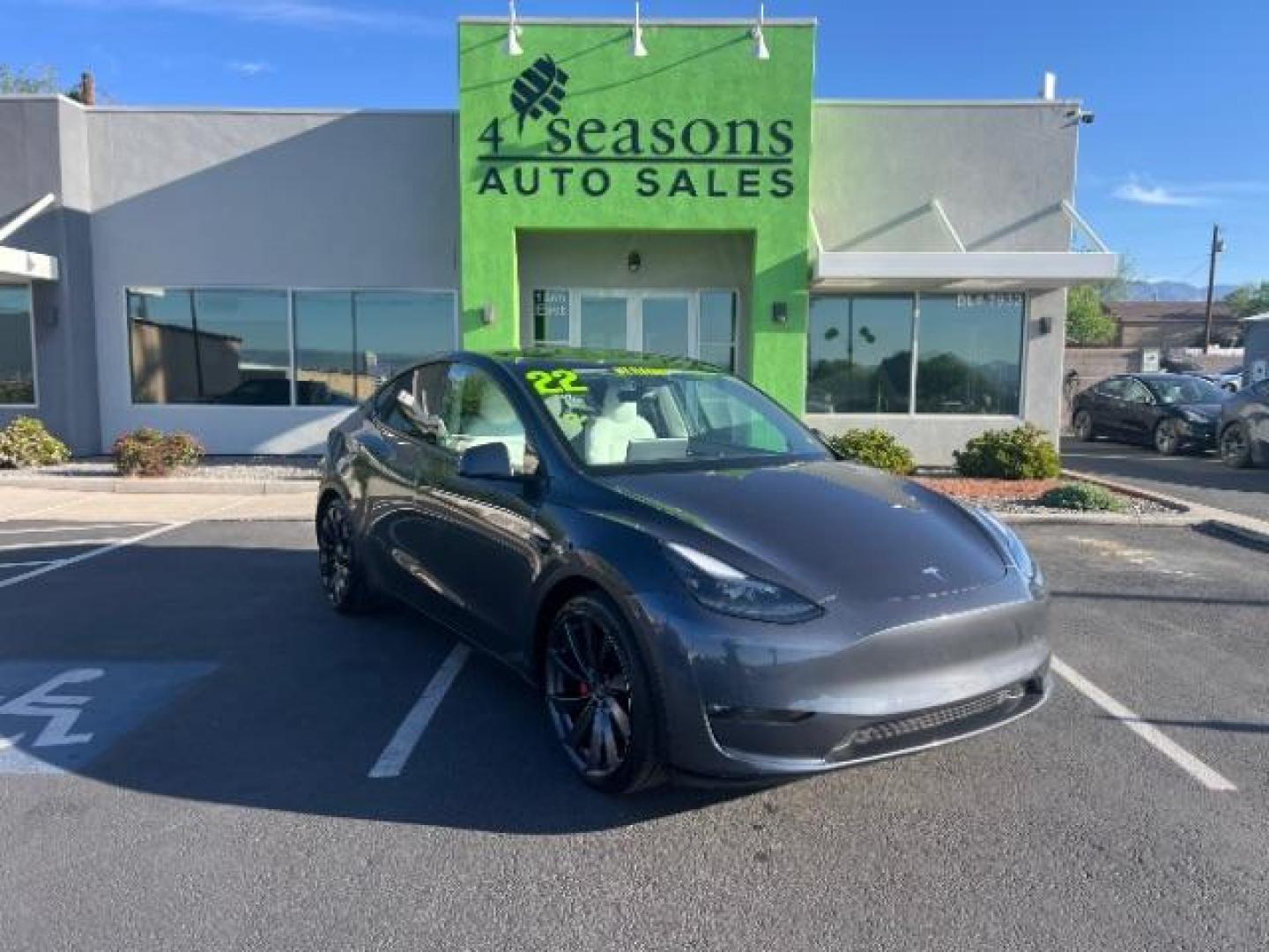 2022 Midnight Silver Metallic /Black Tesla Model Y Performance Dual Motor All-Wheel Drive (7SAYGDEF9NF) with an 2.0L L4 DOHC 16V TUR engine, Continuously Variable Transmission transmission, located at 1865 East Red Hills Pkwy, St. George, 84770, (435) 628-0023, 37.120850, -113.543640 - ****Price includes $4k IRS EV REBATE**** We are setup with IRS to file the rebate directly and take credit off the price of car. Check with IRS EV website to be sure you qualify. Trump has threatened to end rebate so ACT FAST! Full battery and motor warranty up to 120k miles We are THE southern - Photo#0