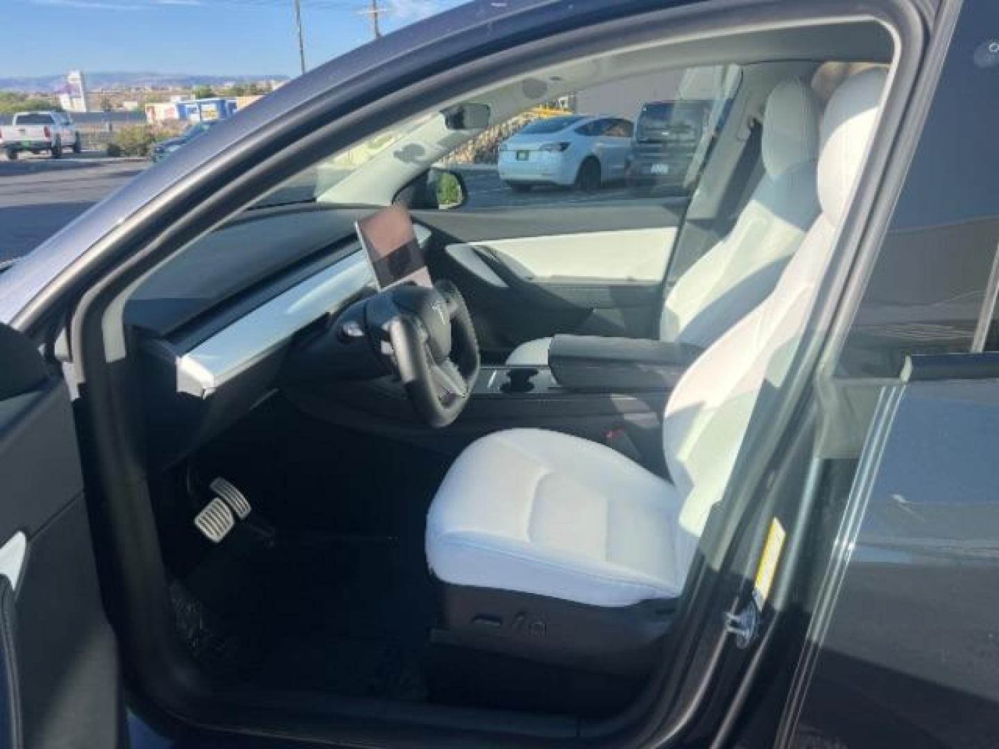 2022 Midnight Silver Metallic /Black Tesla Model Y Performance Dual Motor All-Wheel Drive (7SAYGDEF9NF) with an 2.0L L4 DOHC 16V TUR engine, Continuously Variable Transmission transmission, located at 1865 East Red Hills Pkwy, St. George, 84770, (435) 628-0023, 37.120850, -113.543640 - ****Price includes $4k IRS EV REBATE**** We are setup with IRS to file the rebate directly and take credit off the price of car. Check with IRS EV website to be sure you qualify. Trump has threatened to end rebate so ACT FAST! Full battery and motor warranty up to 120k miles We are THE southern - Photo#16
