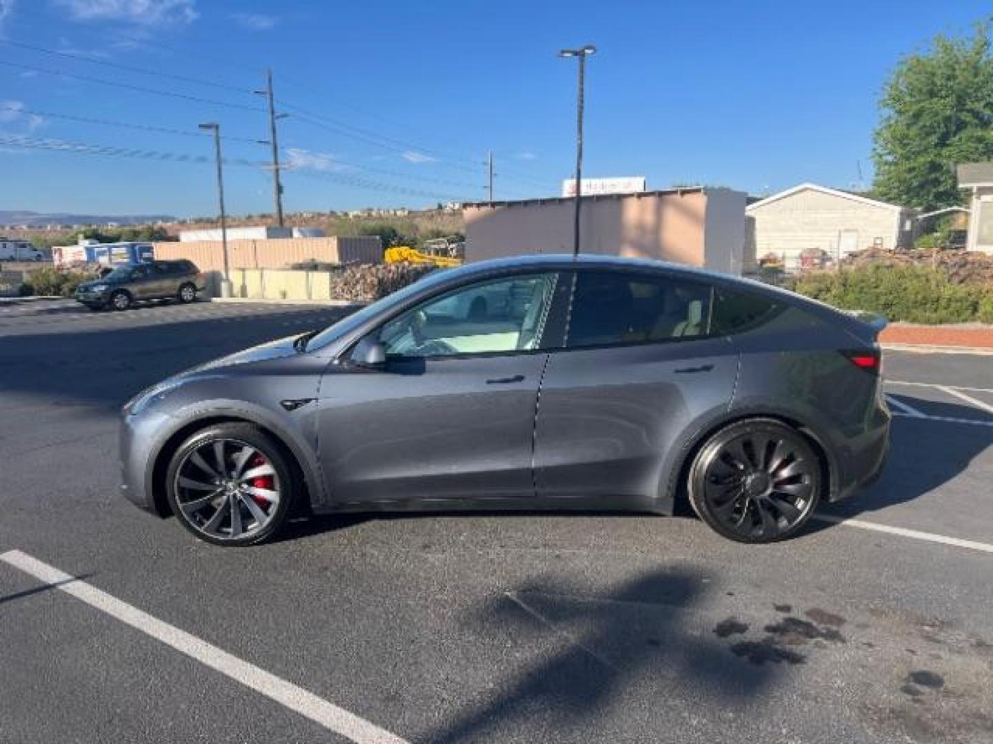 2022 Midnight Silver Metallic /Black Tesla Model Y Performance Dual Motor All-Wheel Drive (7SAYGDEF9NF) with an 2.0L L4 DOHC 16V TUR engine, Continuously Variable Transmission transmission, located at 1865 East Red Hills Pkwy, St. George, 84770, (435) 628-0023, 37.120850, -113.543640 - ****Price includes $4k IRS EV REBATE**** We are setup with IRS to file the rebate directly and take credit off the price of car. Check with IRS EV website to be sure you qualify. Trump has threatened to end rebate so ACT FAST! Full battery and motor warranty up to 120k miles We are THE southern - Photo#5
