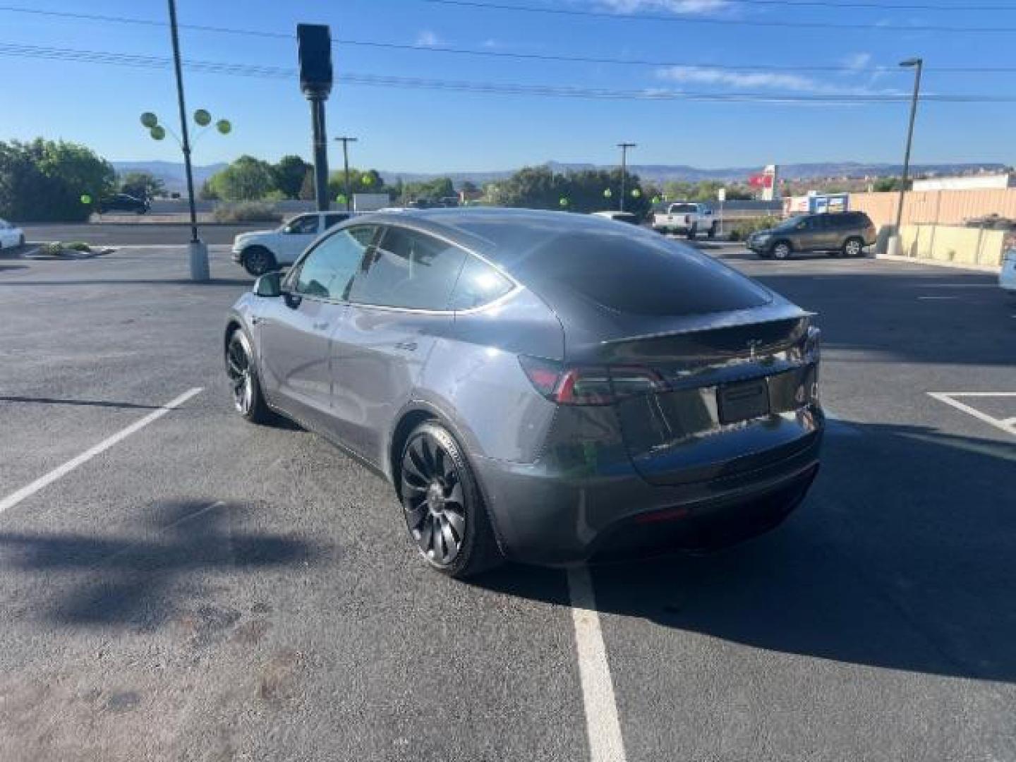 2022 Midnight Silver Metallic /Black Tesla Model Y Performance Dual Motor All-Wheel Drive (7SAYGDEF9NF) with an 2.0L L4 DOHC 16V TUR engine, Continuously Variable Transmission transmission, located at 1865 East Red Hills Pkwy, St. George, 84770, (435) 628-0023, 37.120850, -113.543640 - ****Price includes $4k IRS EV REBATE**** We are setup with IRS to file the rebate directly and take credit off the price of car. Check with IRS EV website to be sure you qualify. Trump has threatened to end rebate so ACT FAST! Full battery and motor warranty up to 120k miles We are THE southern - Photo#6
